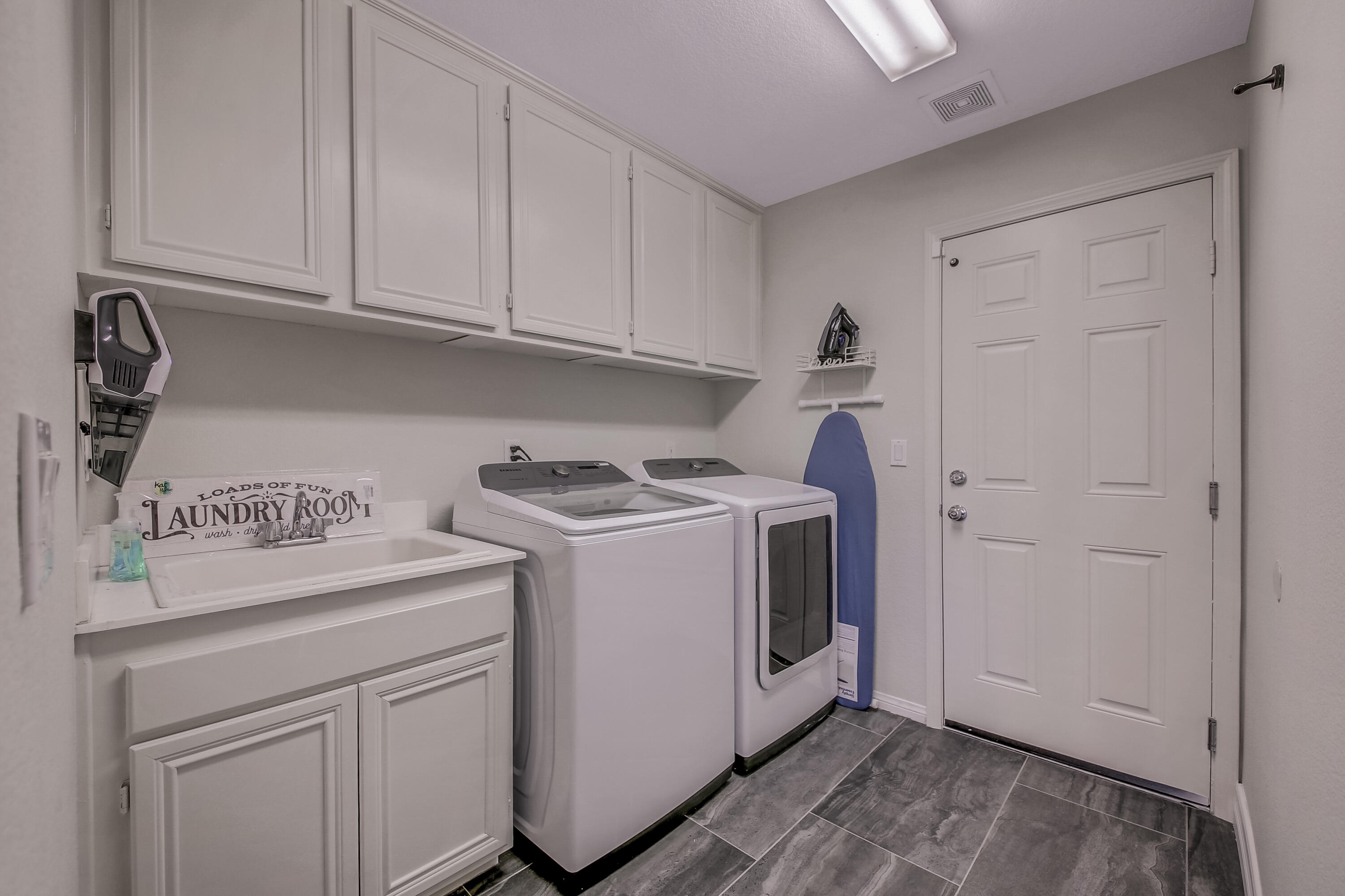 42942 Del Lago Court Indio, CA 92203 - Photo 29 of 75 a utility room with dryer and washer