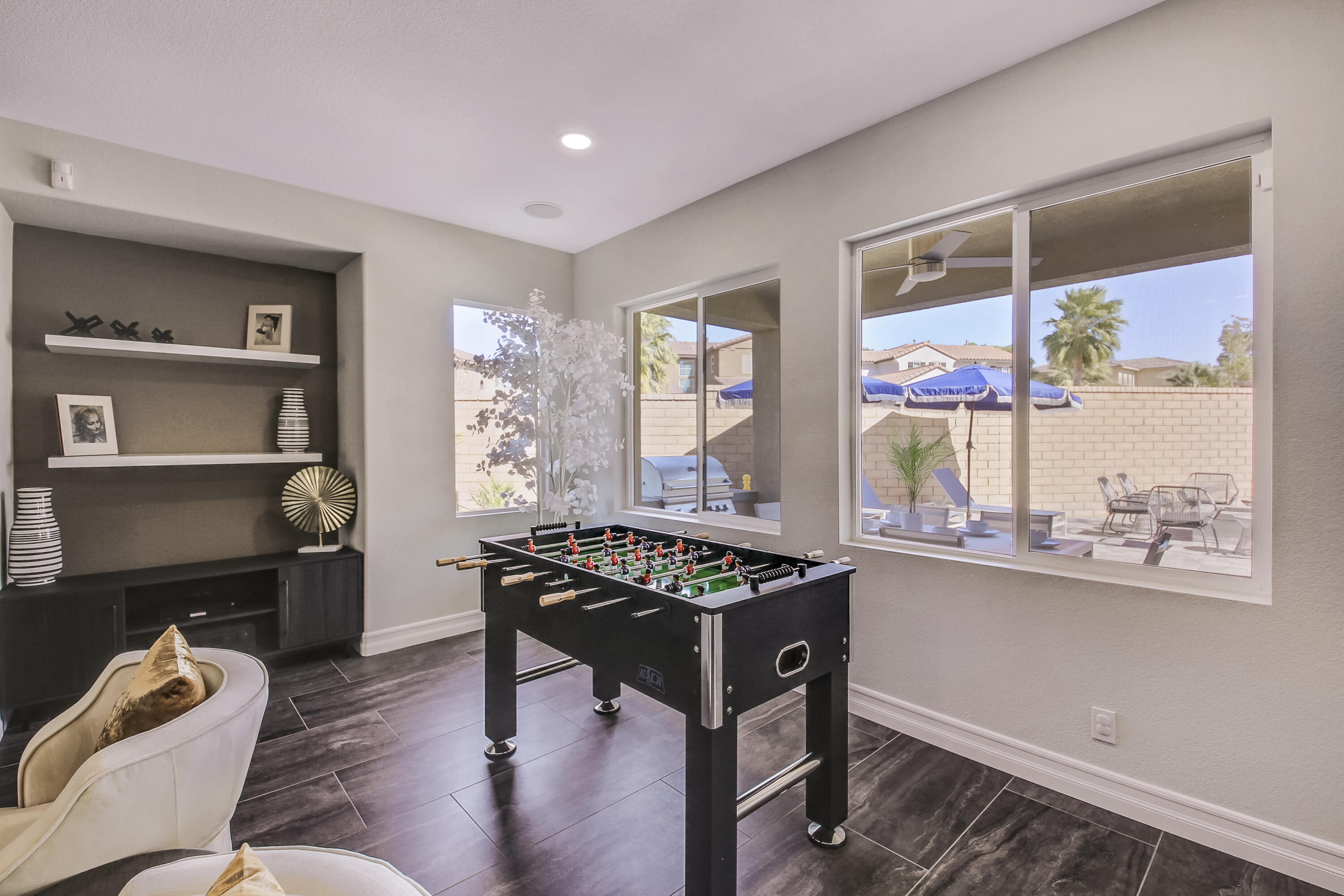 42942 Del Lago Court Indio, CA 92203 - Photo 31 of 75 a view of a workspace with furniture and a window