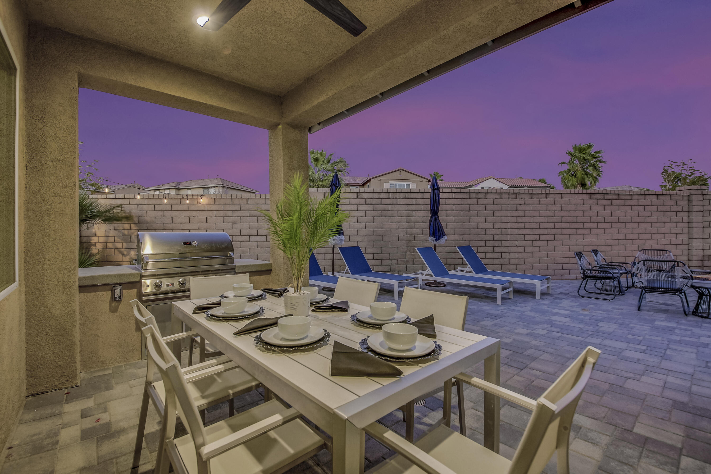 42942 Del Lago Court Indio, CA 92203 - Photo 33 of 75 a view of a dinning table and chairs in the patio
