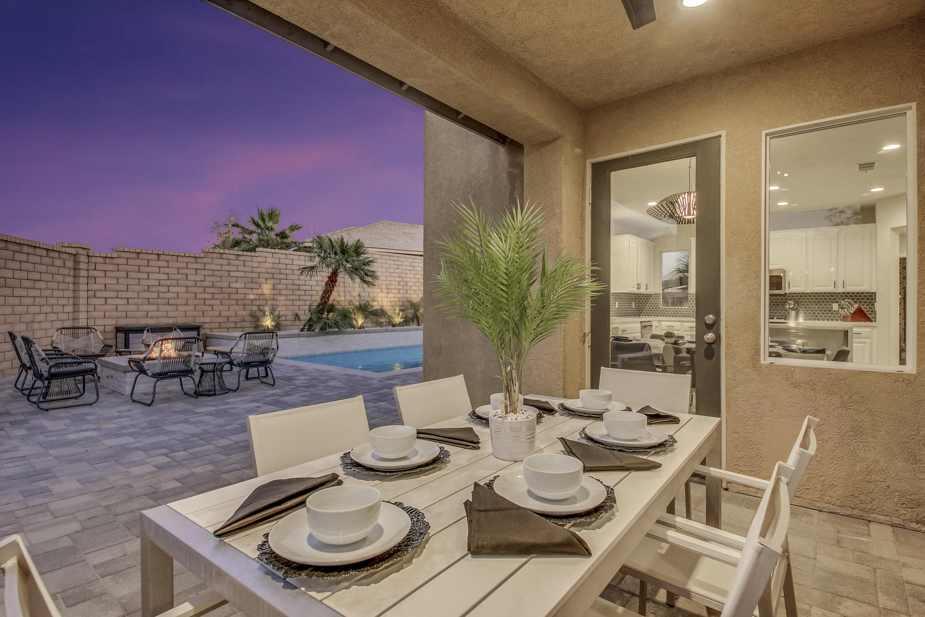 42942 Del Lago Court Indio, CA 92203 - Photo 4 of 75 a outdoor space with furniture and a potted plant