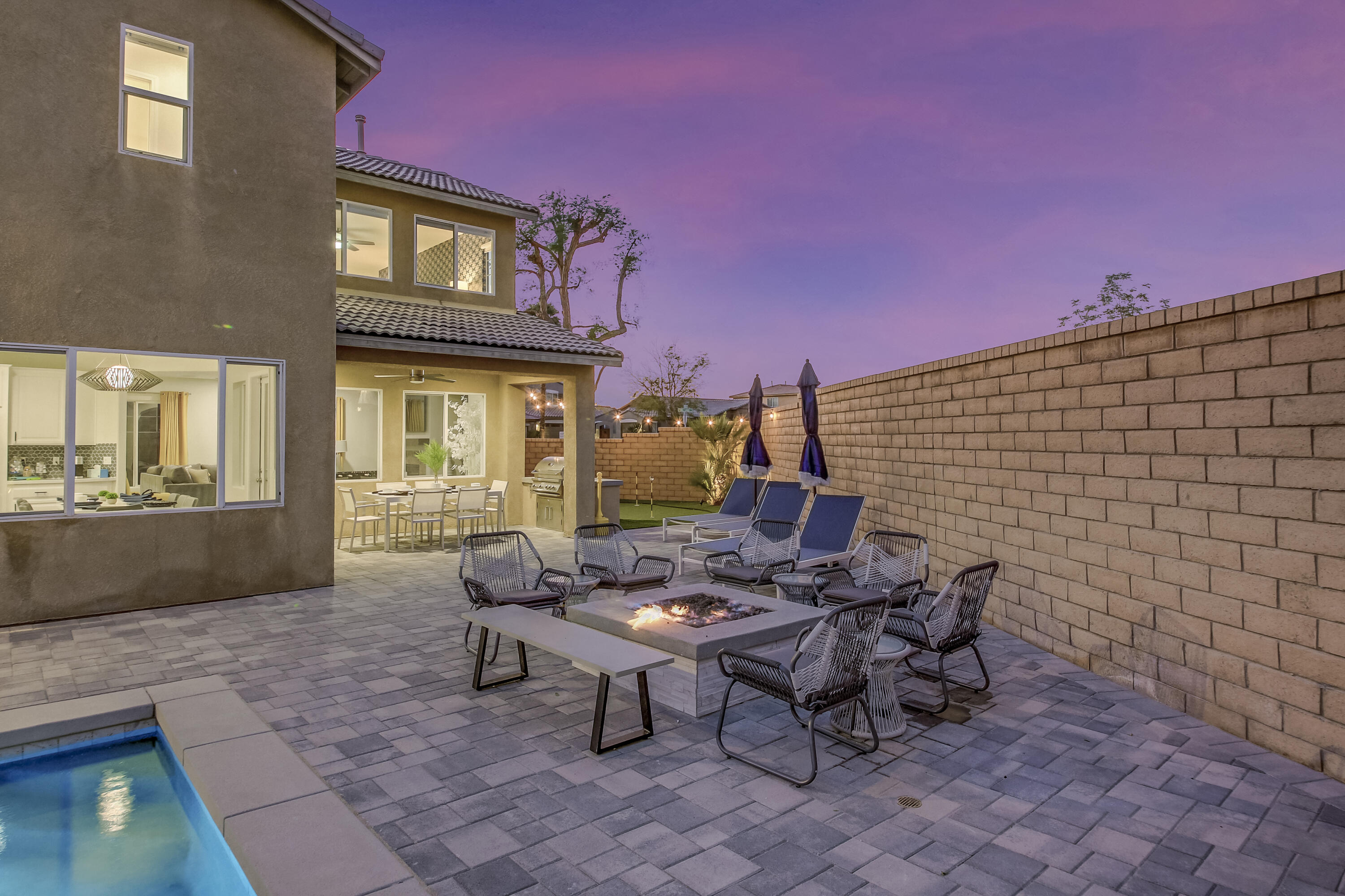 42942 Del Lago Court Indio, CA 92203 - Photo 42 of 75 a view of a dinning tables and chair in the patio