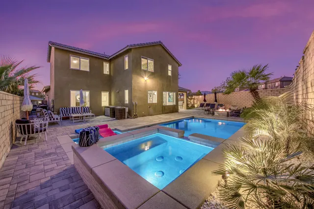 an aerial view of residential houses and outdoor space