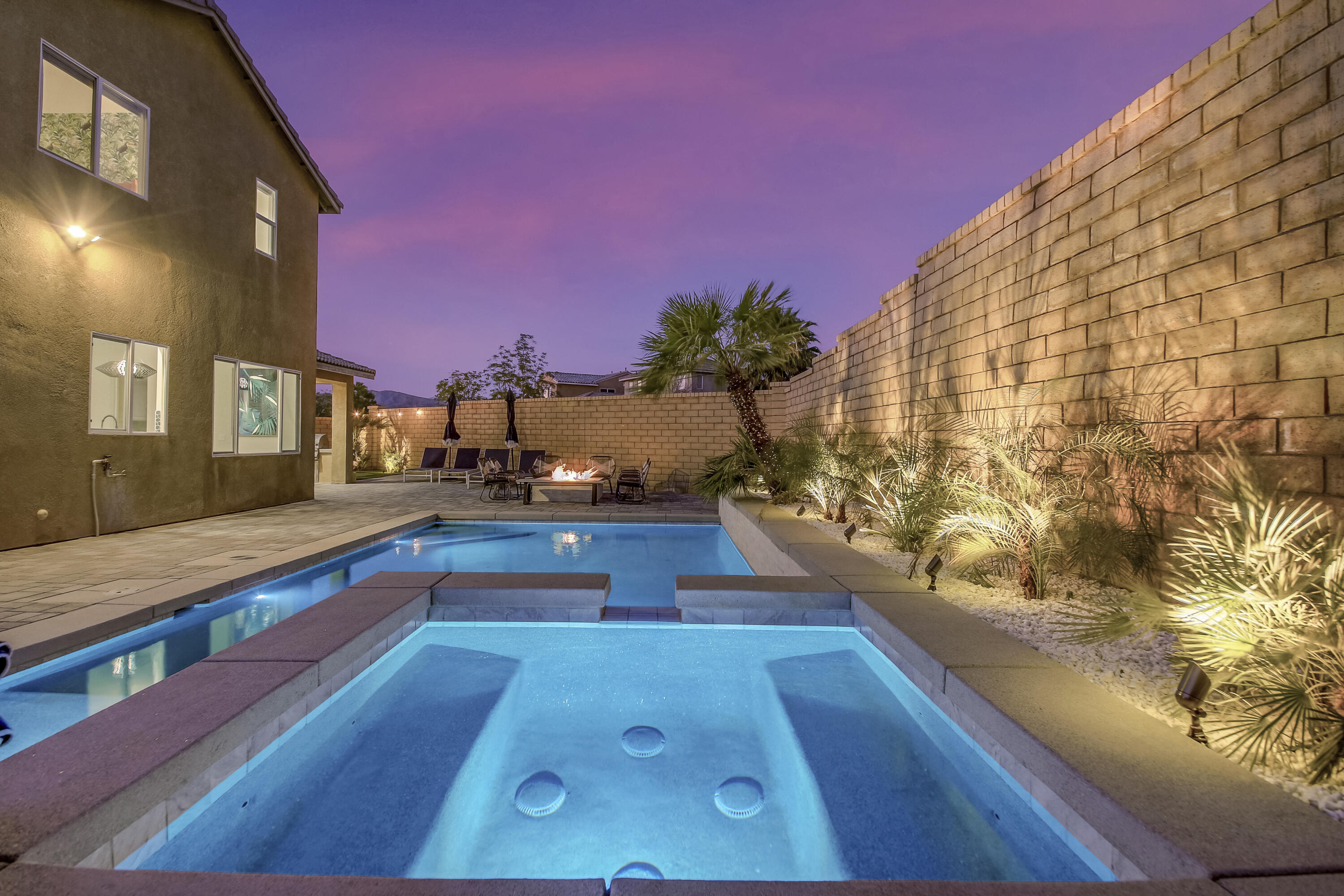 42942 Del Lago Court Indio, CA 92203 - Photo 47 of 75 a swimming pool with outdoor seating and wooden floor