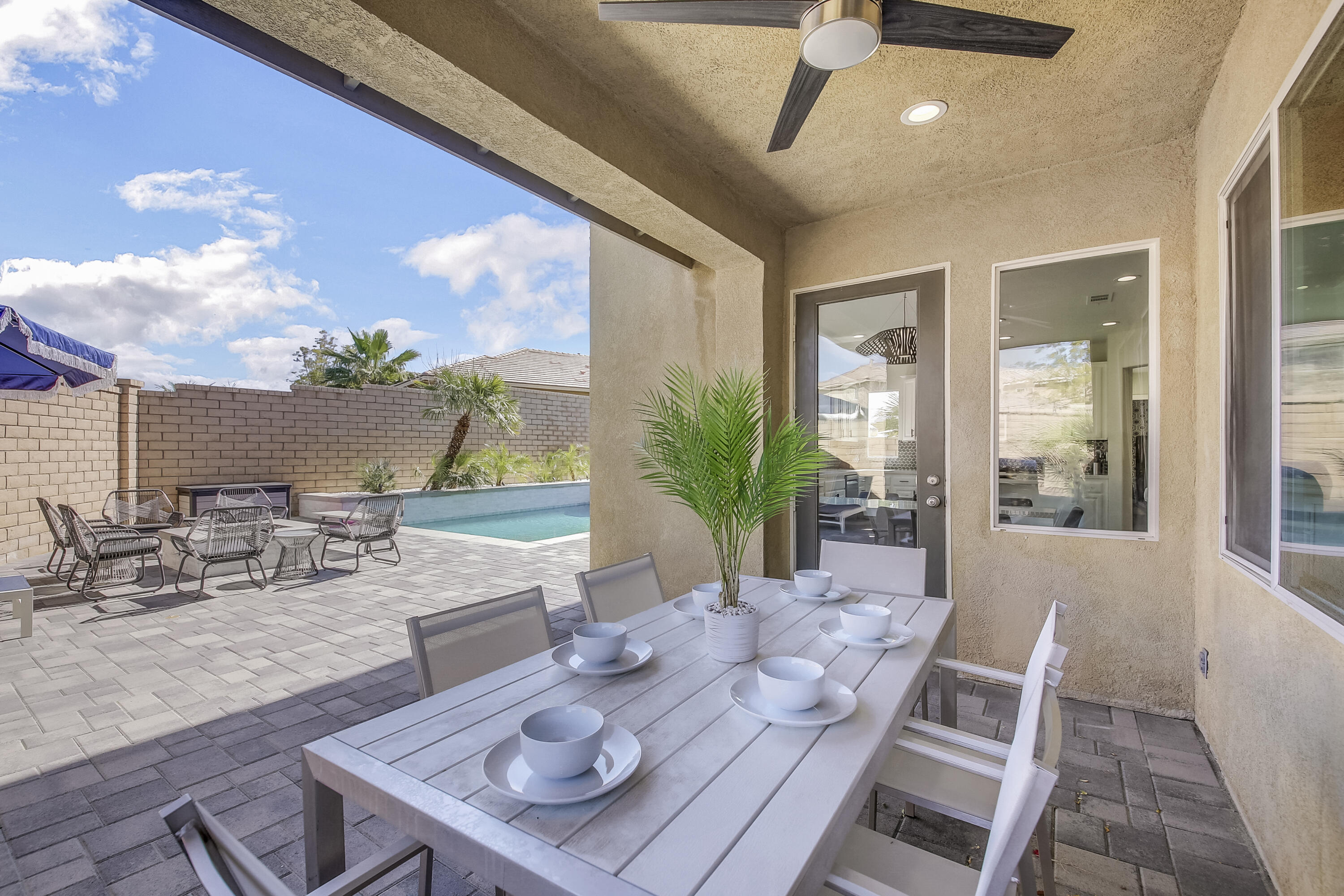 42942 Del Lago Court Indio, CA 92203 - Photo 50 of 75 a view of a dining room with furniture window and outside view