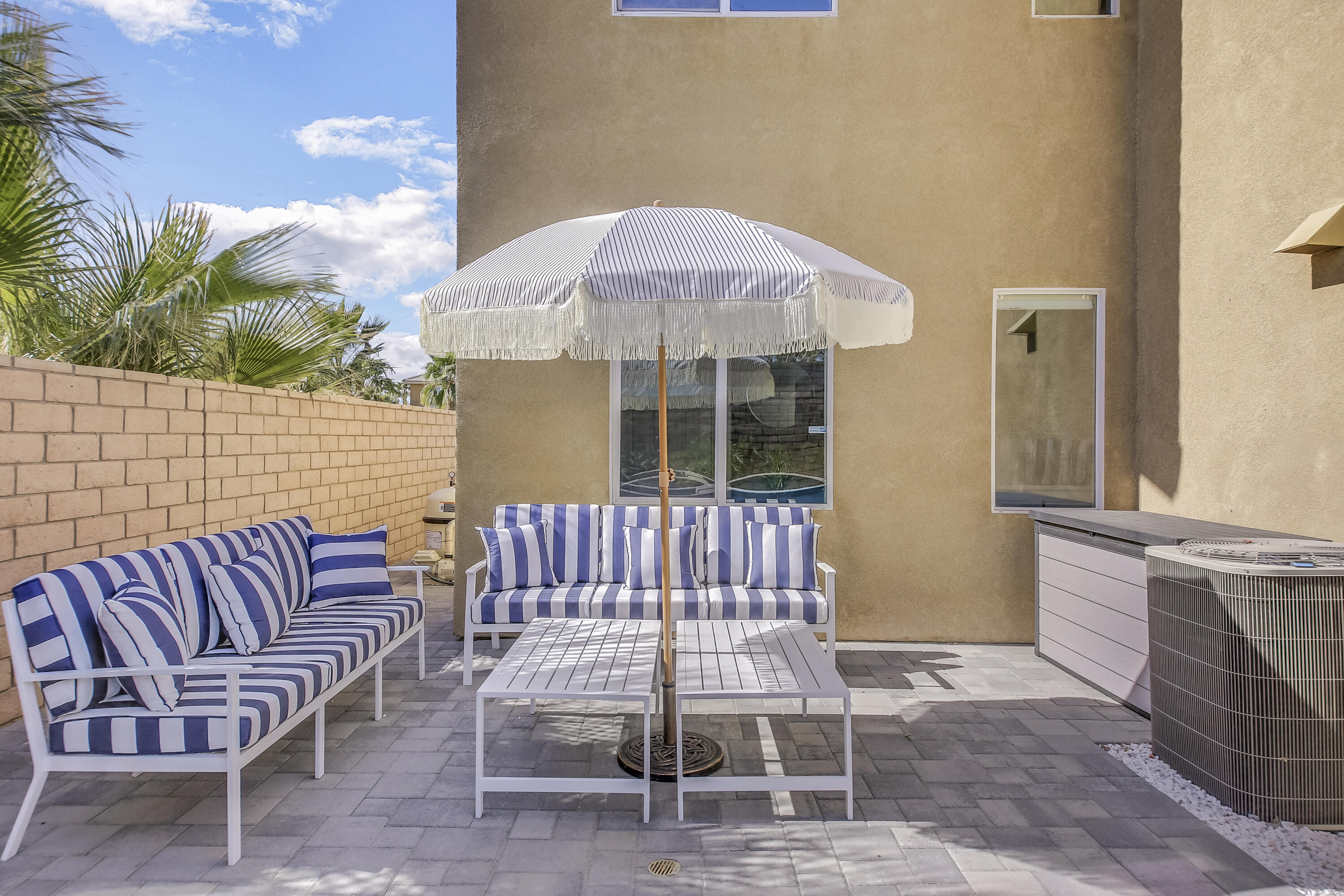 42942 Del Lago Court Indio, CA 92203 - Photo 61 of 75 a view of a patio with a table and chairs