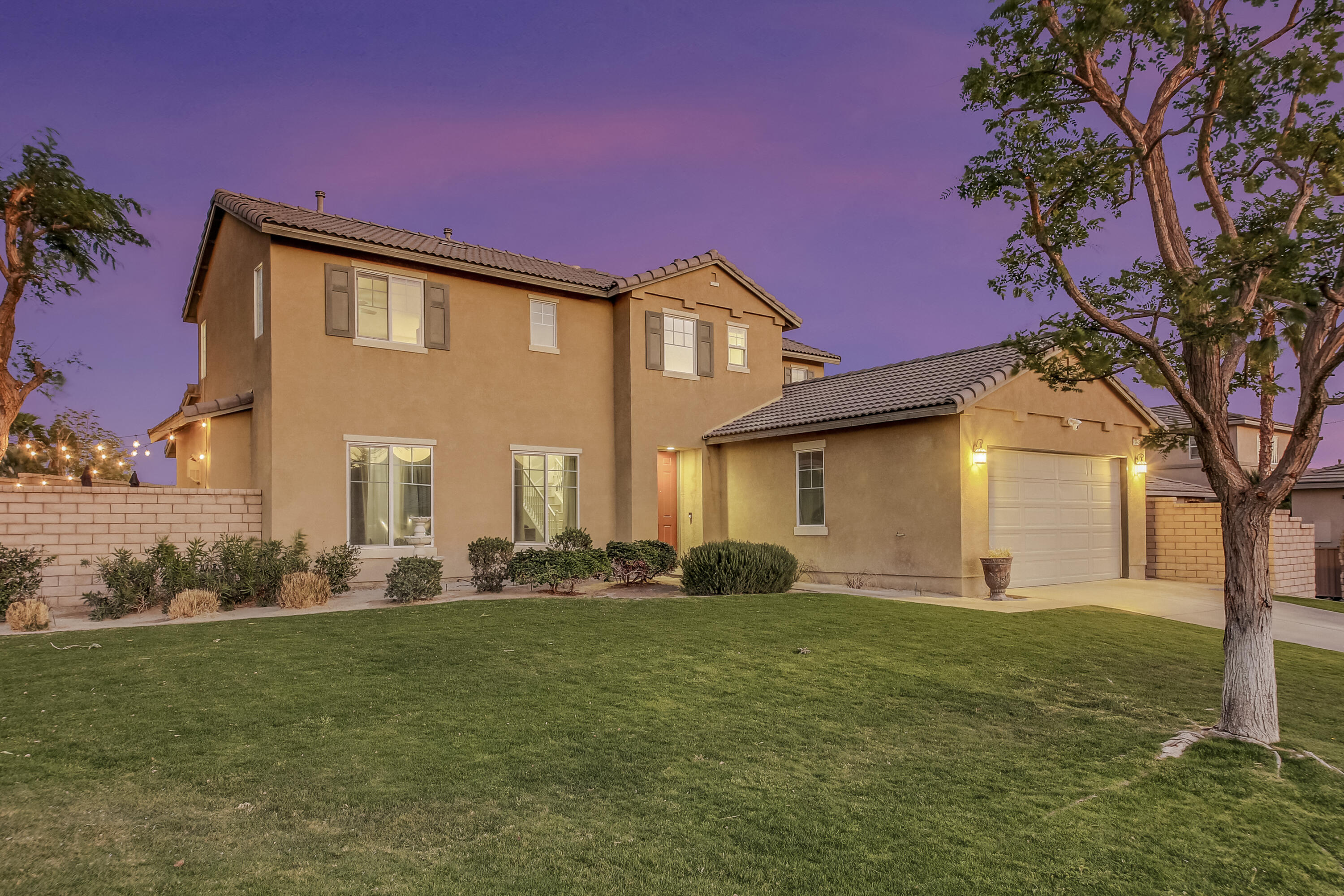 42942 Del Lago Court Indio, CA 92203 - Photo 63 of 75 a front view of a house with a yard