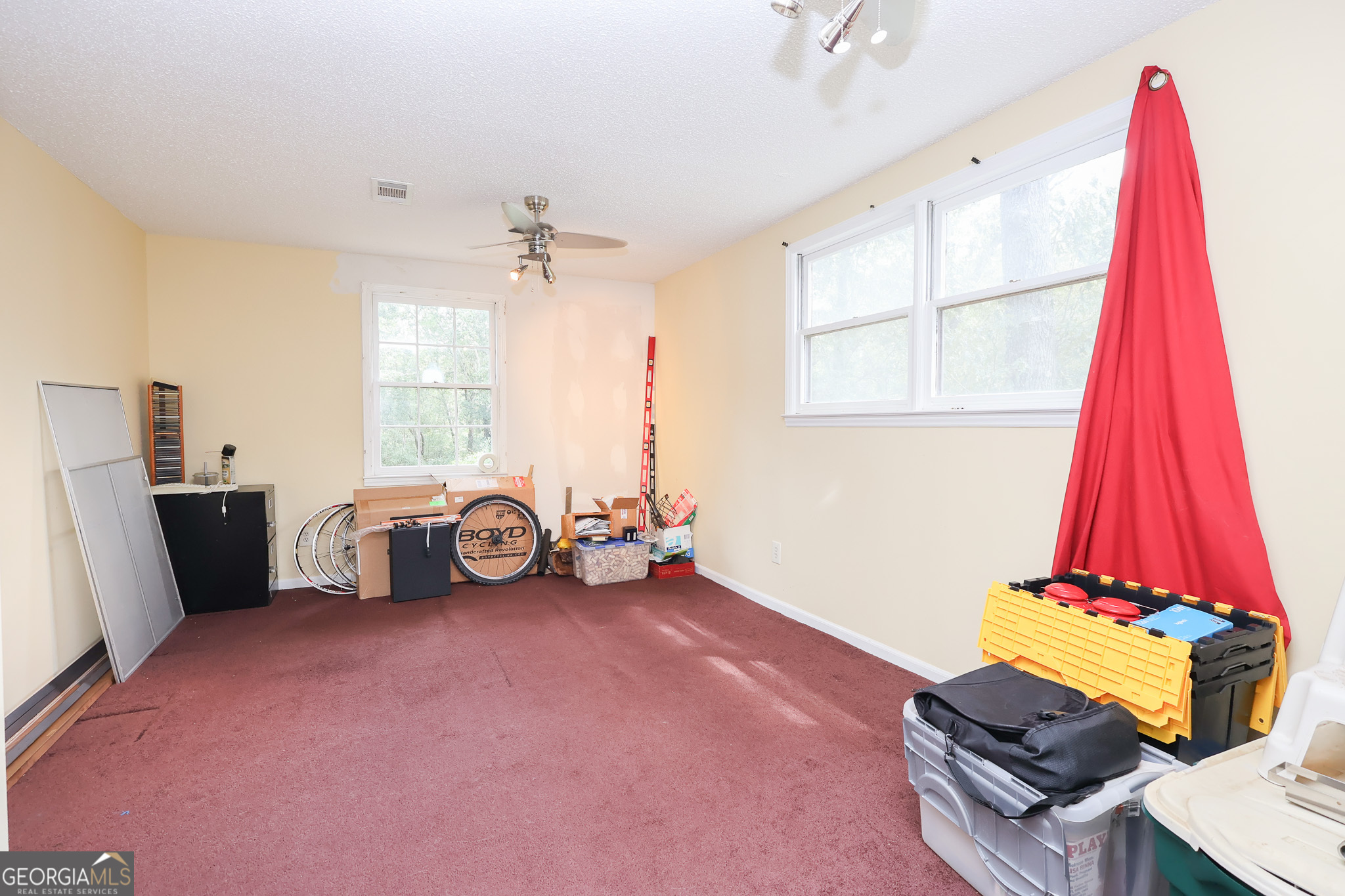 299 Chapman Road Lizella, GA 31052 - Photo 15 of 21 a view of a room with furniture and a window
