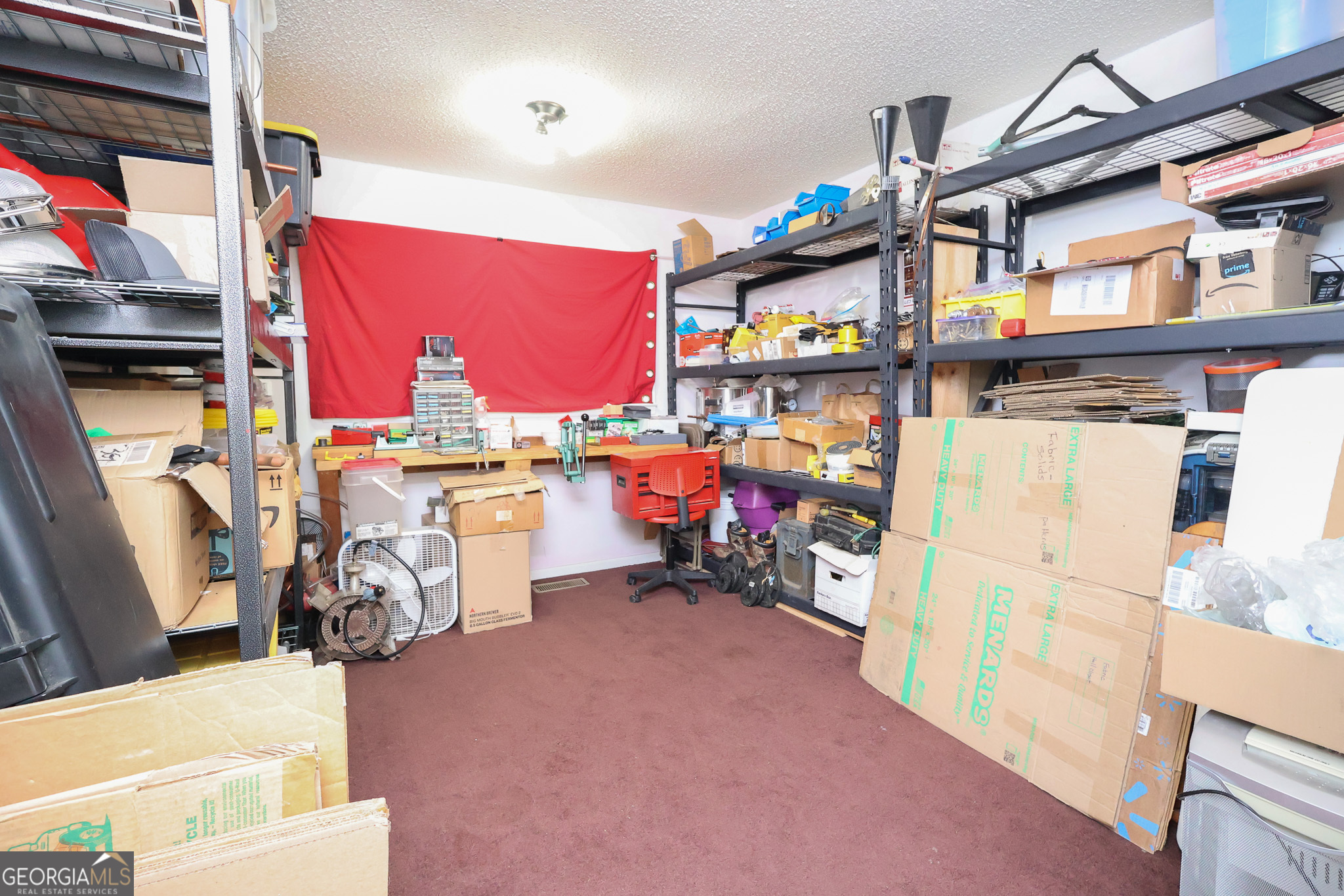 299 Chapman Road Lizella, GA 31052 - Photo 16 of 21 a view of storage and utility room