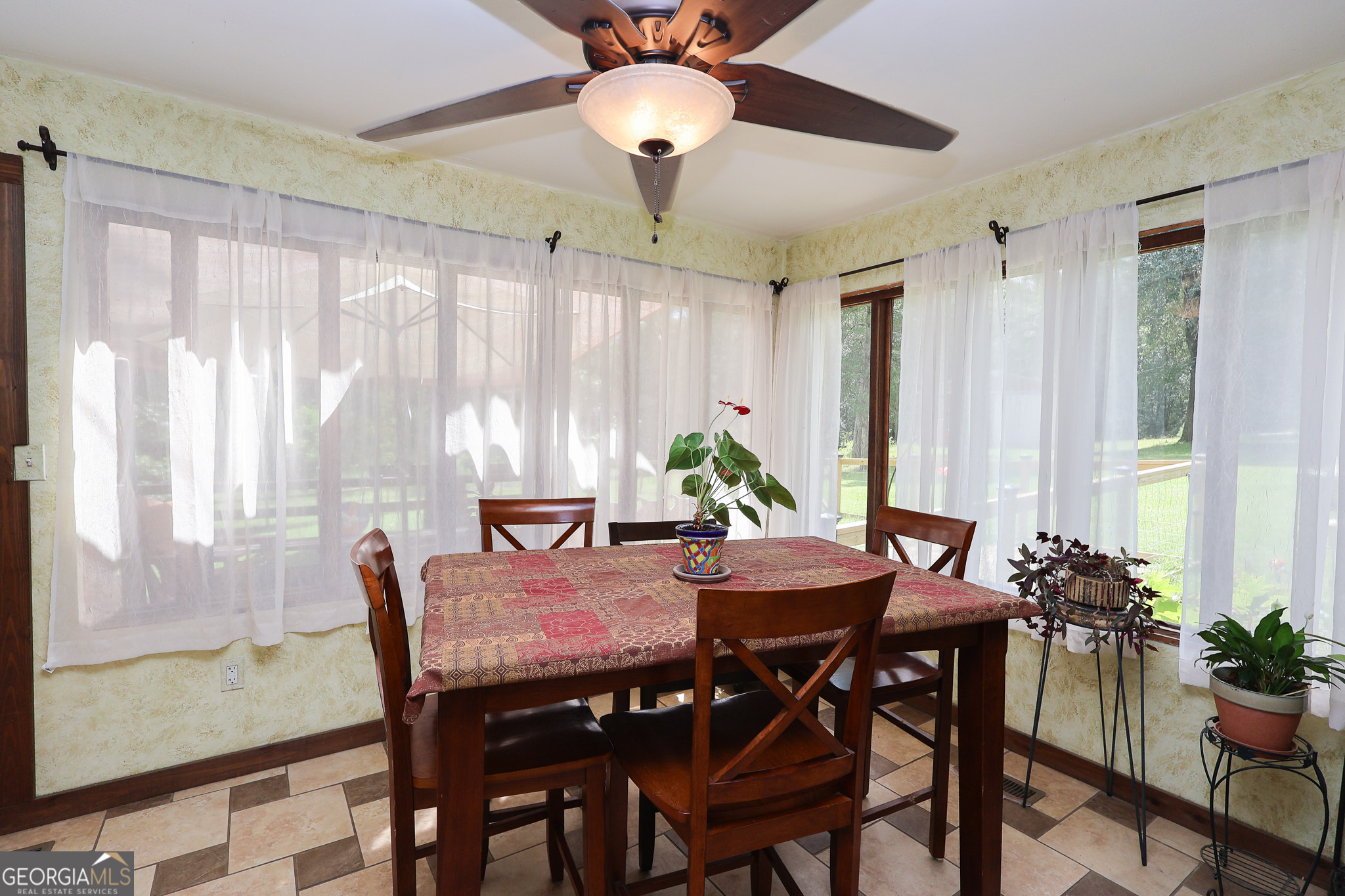 299 Chapman Road Lizella, GA 31052 - Photo 9 of 21 a view of a dining room with furniture and window