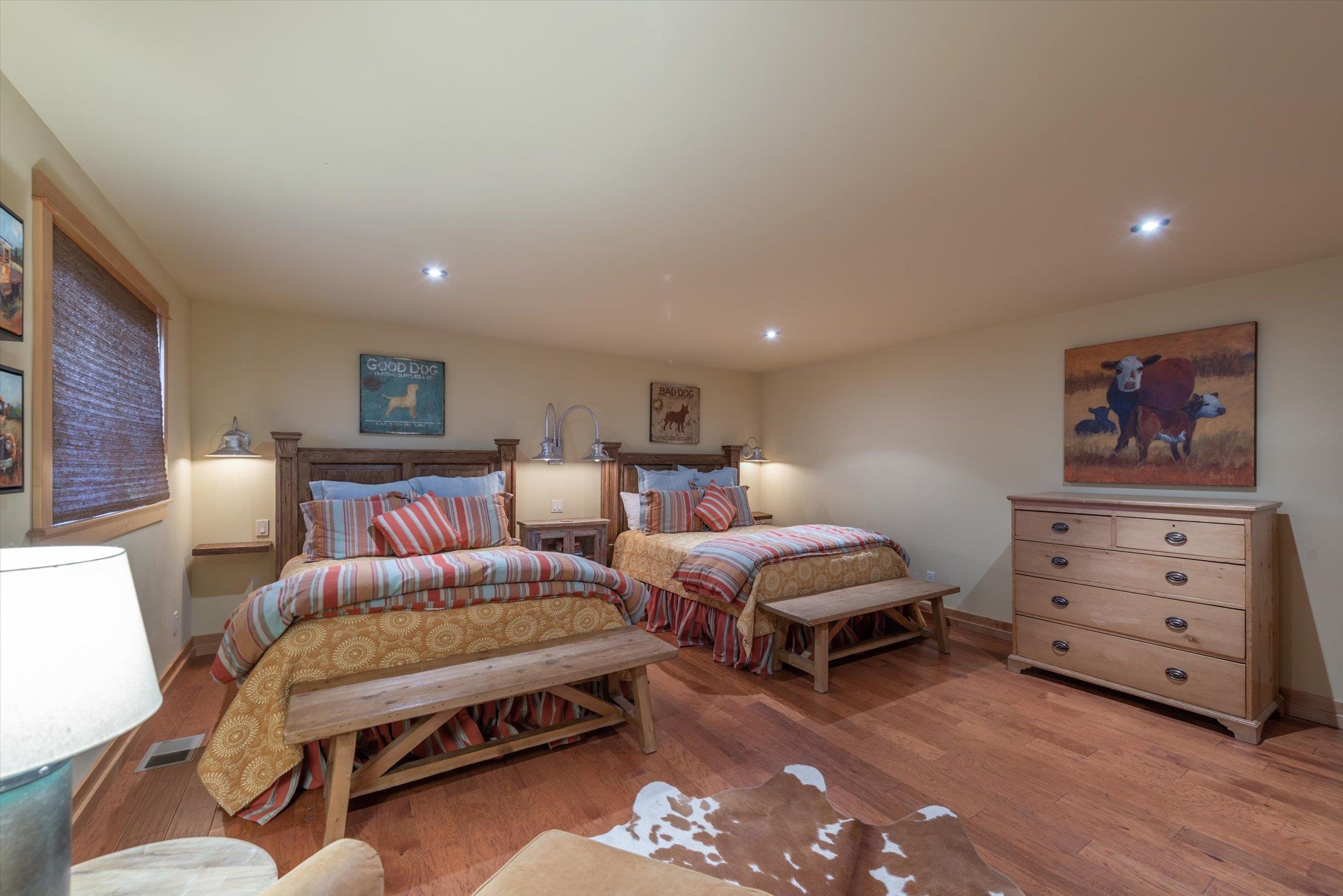 12968 Solvang Way Truckee, CA 96161 - Photo 14 of 21 a spacious bedroom with a bed and furniture