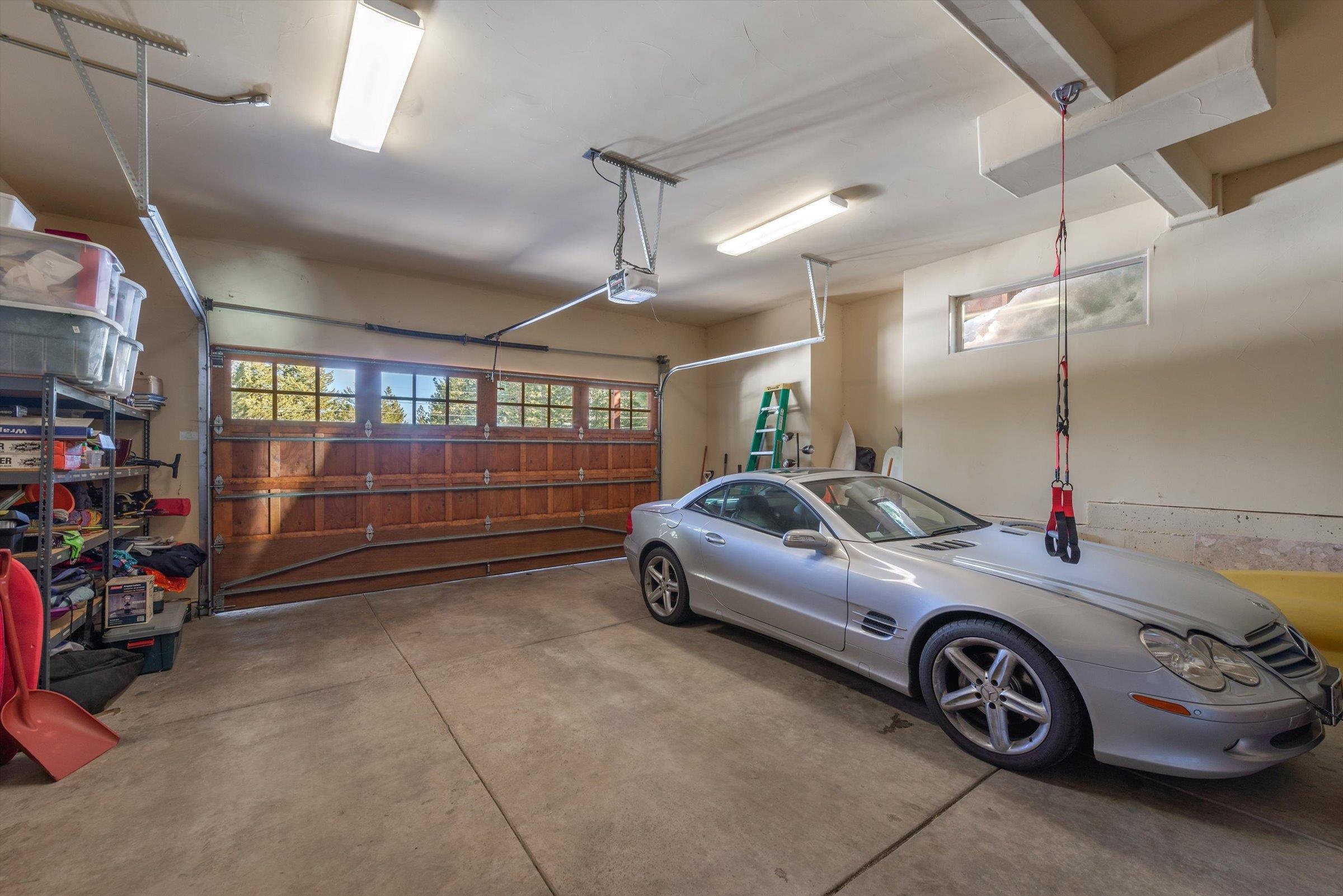 12968 Solvang Way Truckee, CA 96161 - Photo 18 of 21 a car is parked in a garage