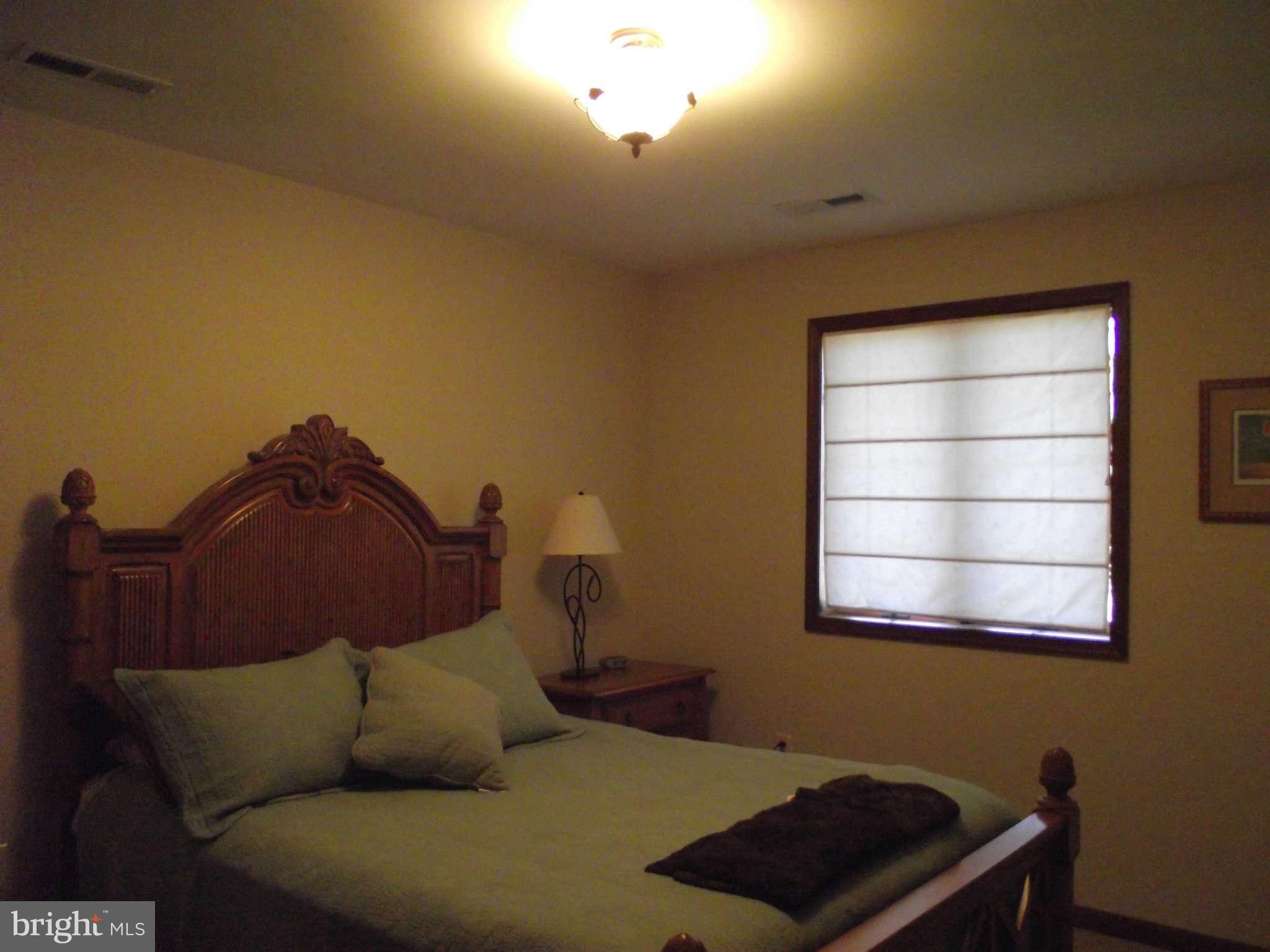 9880 McQueen Road Lusby, MD 20657 - Photo 22 of 30 Bedroom