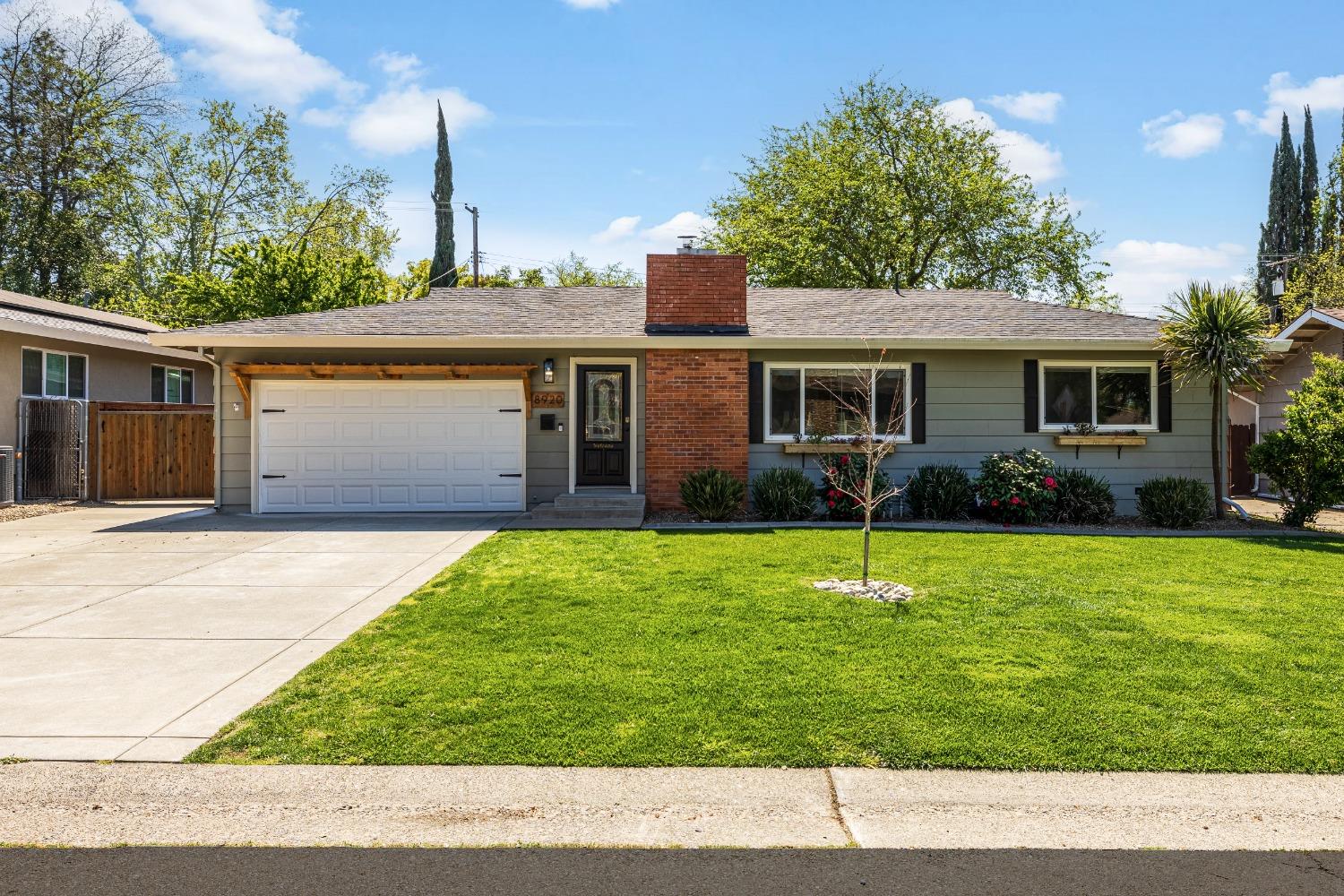 a house view with a garden space