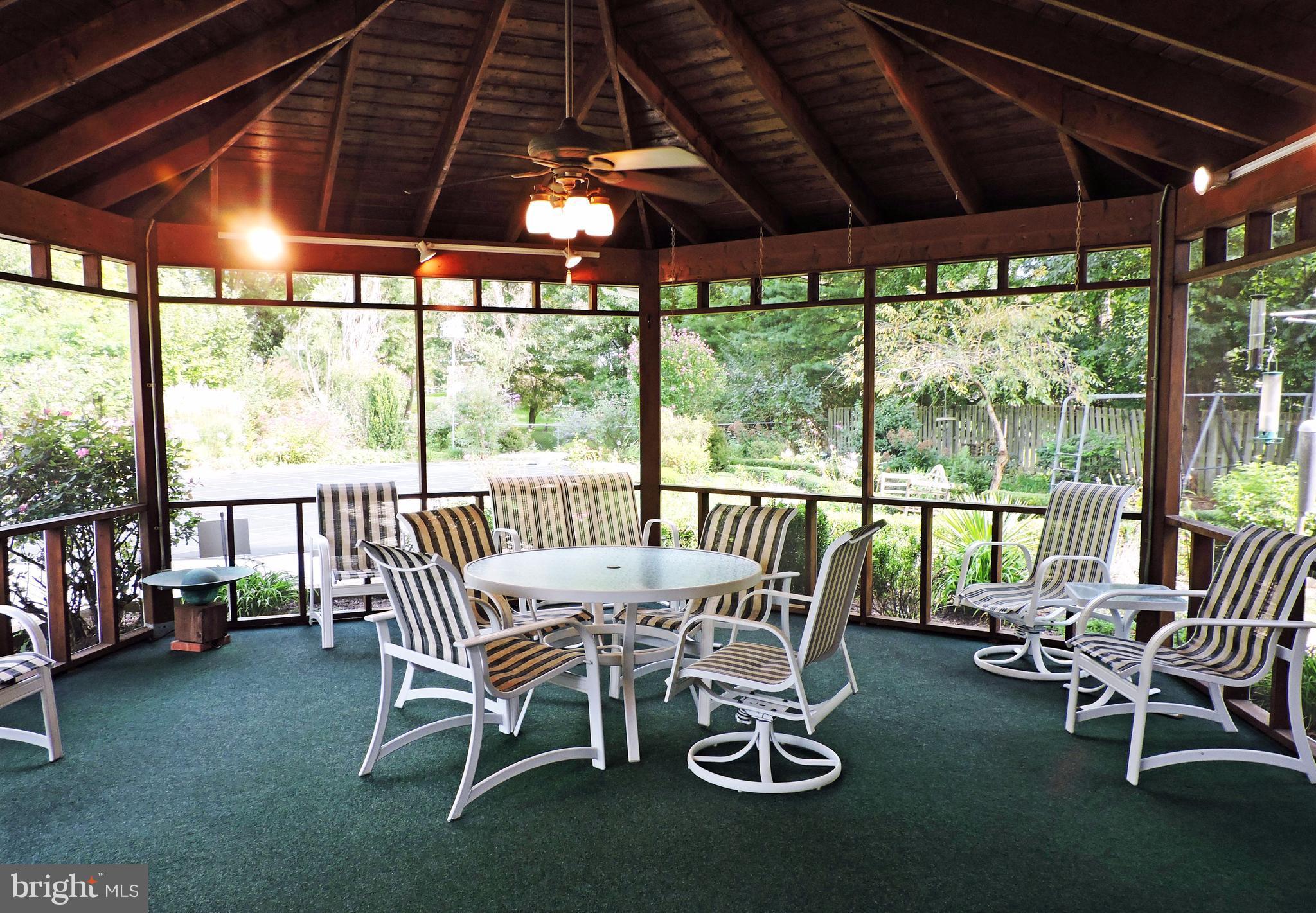 14129 Rippling Brook Drive Silver Spring, MD 20906 - Photo 22 of 25 A masterful porch to enjoy throughout the day!