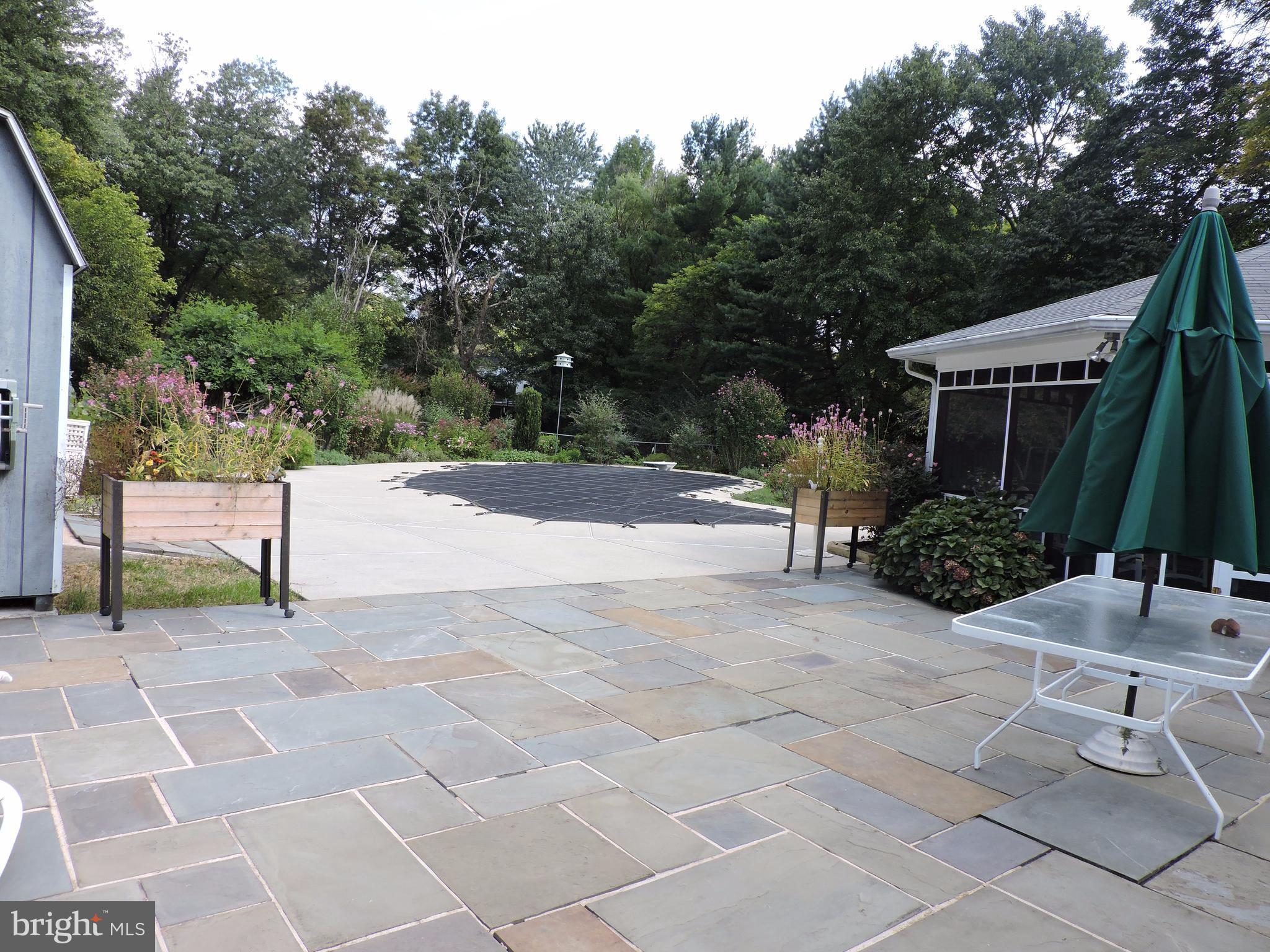 14129 Rippling Brook Drive Silver Spring, MD 20906 - Photo 23 of 25 Large slate patio for outdoor entertaining.