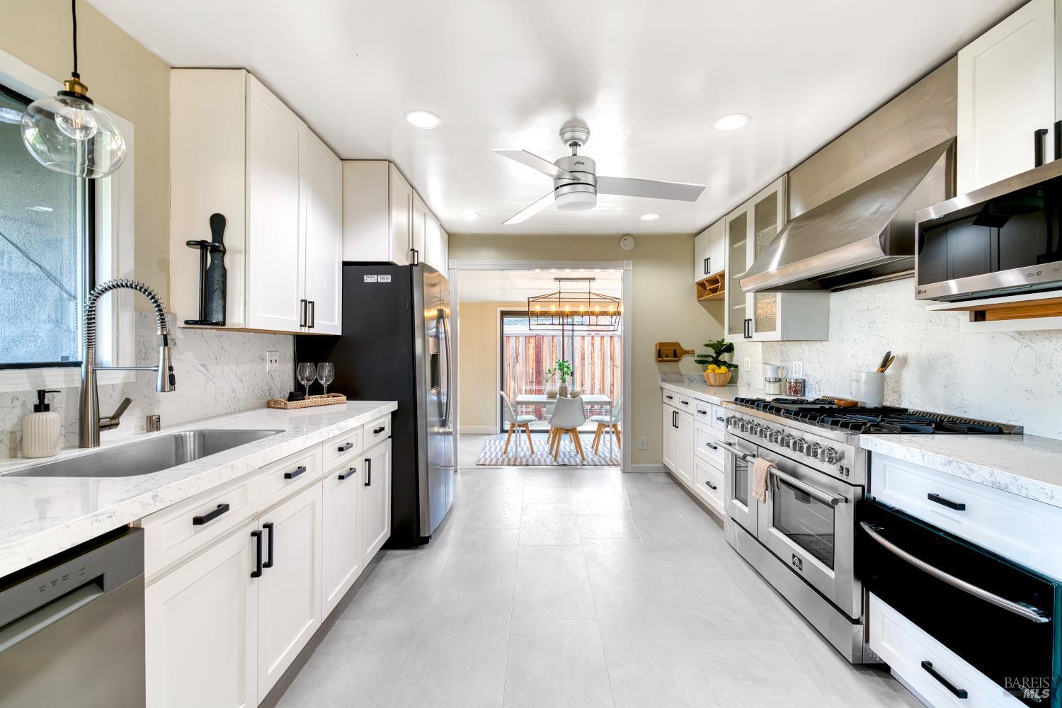 1534 Buchanan Street Novato, CA 94947 - Photo 5 of 30 a large kitchen with stainless steel appliances lots of counter space sink and cabinets