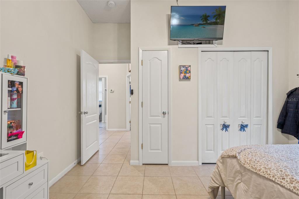 11128 Lomita Wren Road Weeki Wachee, FL 34614 - Photo 25 of 39 a view of hallway with livingroom and furniture