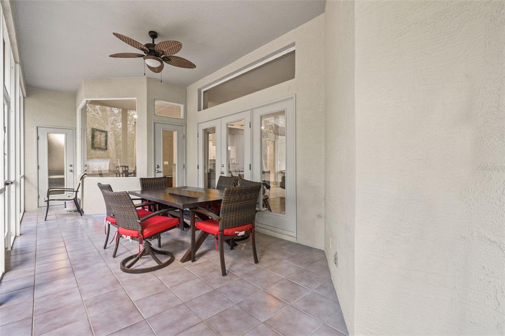 11128 Lomita Wren Road Weeki Wachee, FL 34614 - Photo 29 of 39 a view of a livingroom with furniture and wooden floor