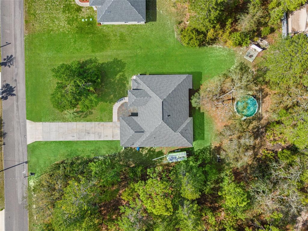 11128 Lomita Wren Road Weeki Wachee, FL 34614 - Photo 37 of 39 an aerial view of a house