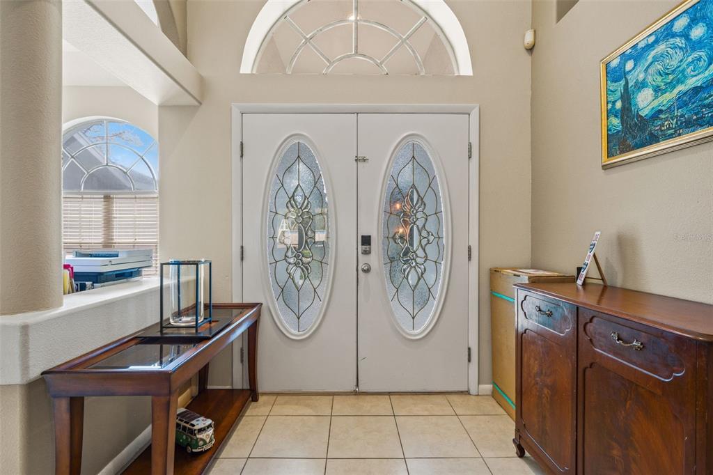 11128 Lomita Wren Road Weeki Wachee, FL 34614 - Photo 6 of 39 a view of a hallway with washer and dryer