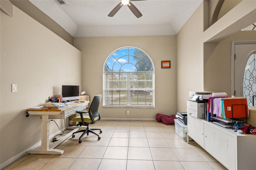 11128 Lomita Wren Road Weeki Wachee, FL 34614 - Photo 10 of 39 a workspace with a window
