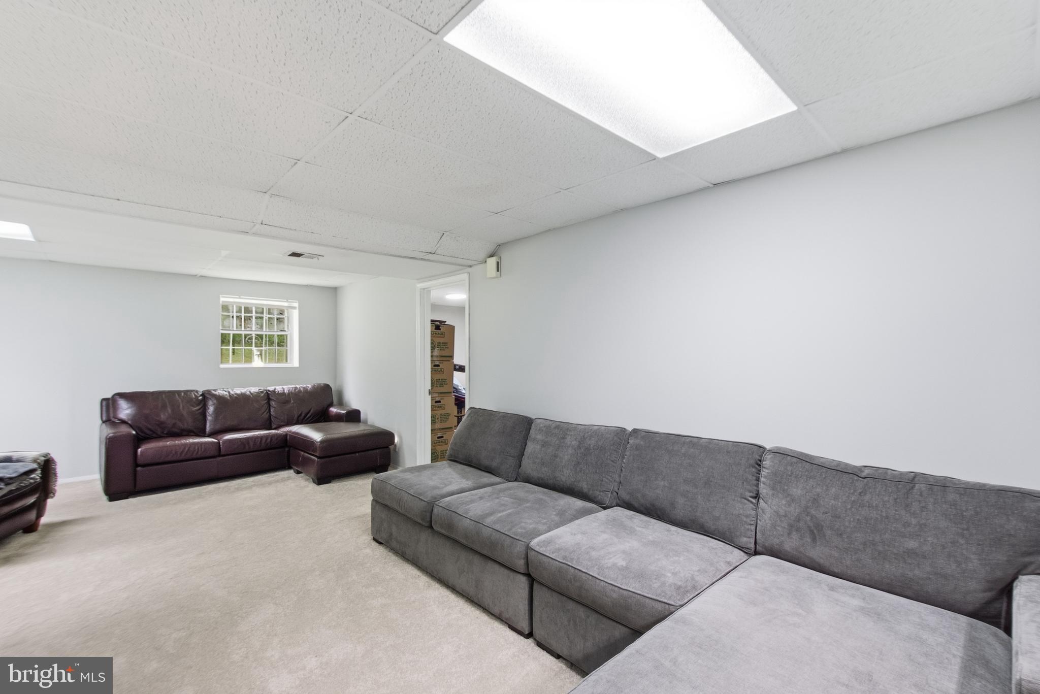5121 South Barnaby Road Temple Hills, MD 20748 - Photo 22 of 35 supersized lower level rec rm