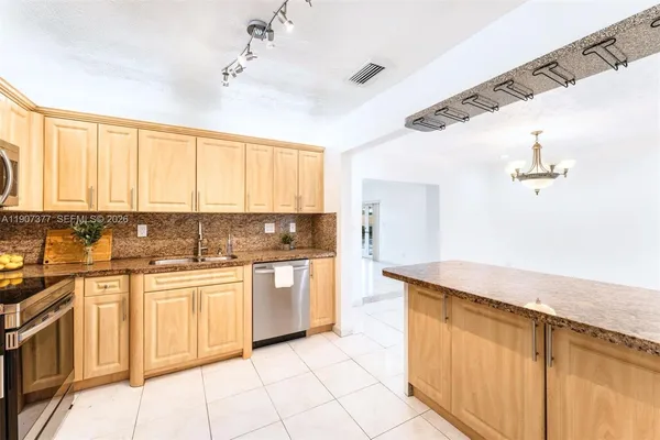 $715,000 | 10835 Southwest 152nd Terrace, Miami, FL 33157