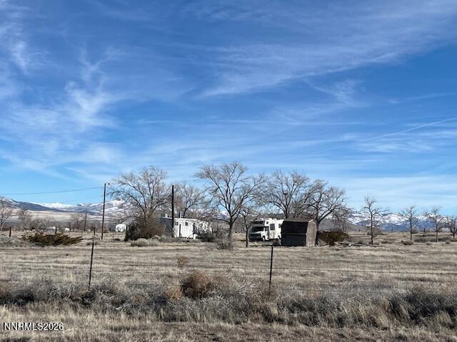 100 Prince Royal Road Imlay, NV 89418 - Photo 3 of 5 a view of a dry yard with wooden fence