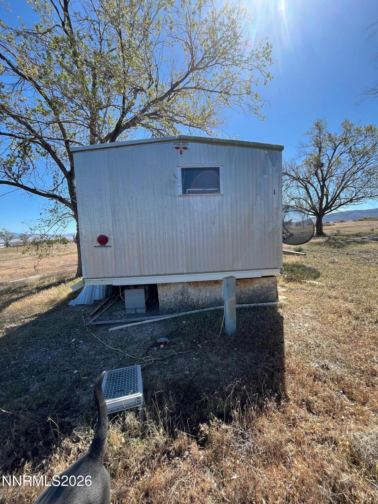 100 Prince Royal Road Imlay, NV 89418 - Photo 9 of 12 a view of backyard with wooden fence