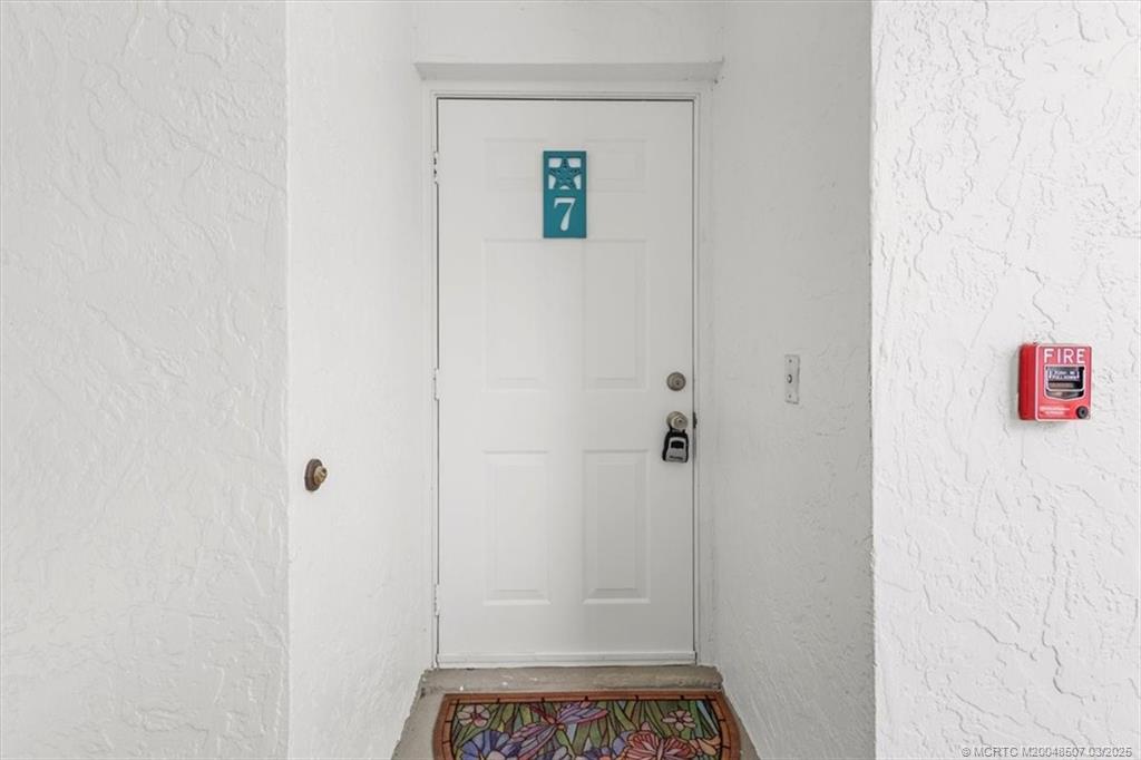 6082 Southeast Landing Way, Unit 7 Stuart, FL 34997 - Photo 3 of 36 Front door / exterior view
