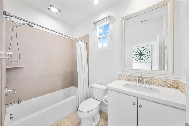 a view of a chairs and table in the patio