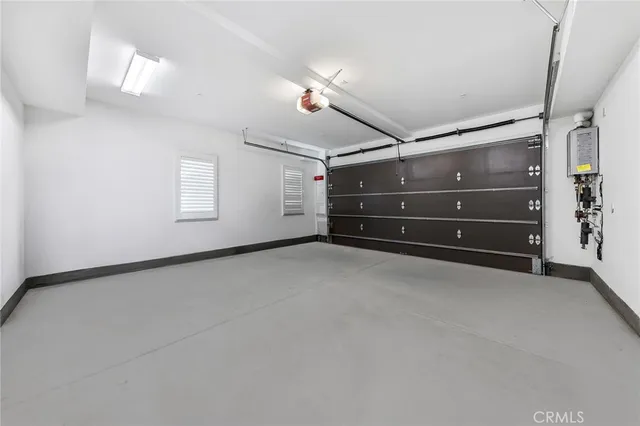 an aerial view of a building with parking