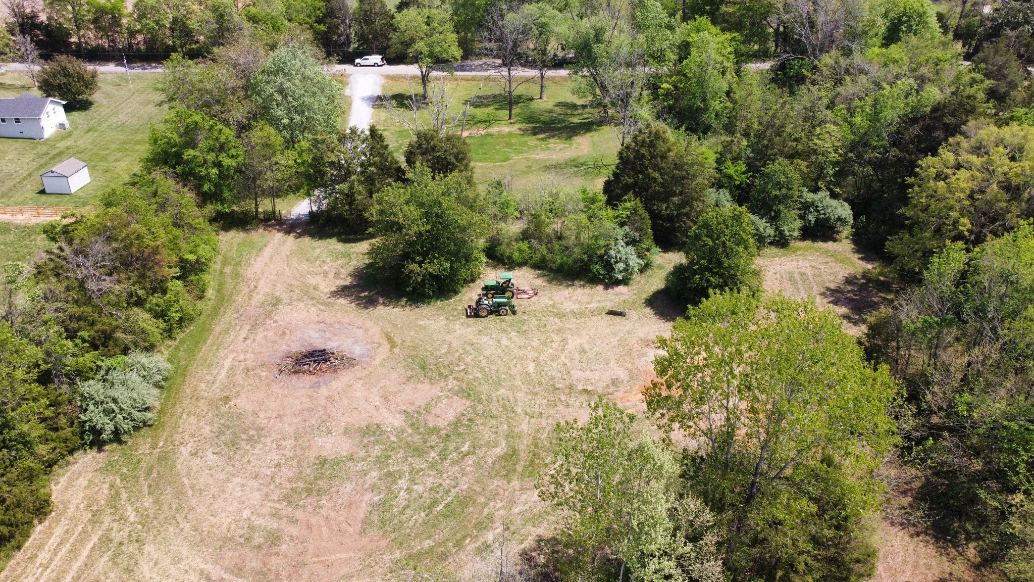 628 Burnett Road Mount Juliet, TN 37122 - Photo 3 of 5 a view of a yard with plants and large trees