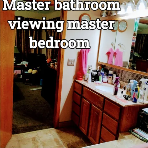 a kitchen with stainless steel appliances granite countertop a stove refrigerator and cabinets