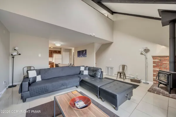 a living room with furniture and a couch