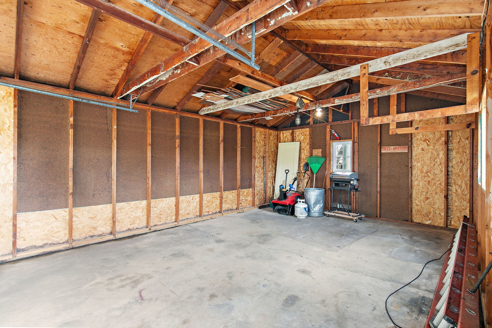 217 South 3rd Street DeKalb, IL 60115 - Photo 19 of 20 a view of an empty room with wooden walls