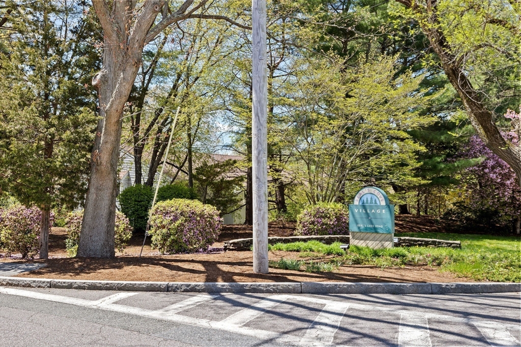 4 Beal's Cove Road, Unit B Hingham, MA 02043 - Photo 16 of 16 a front view of a house with garden