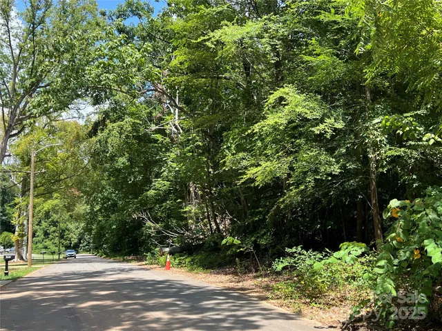 a view of street with houses