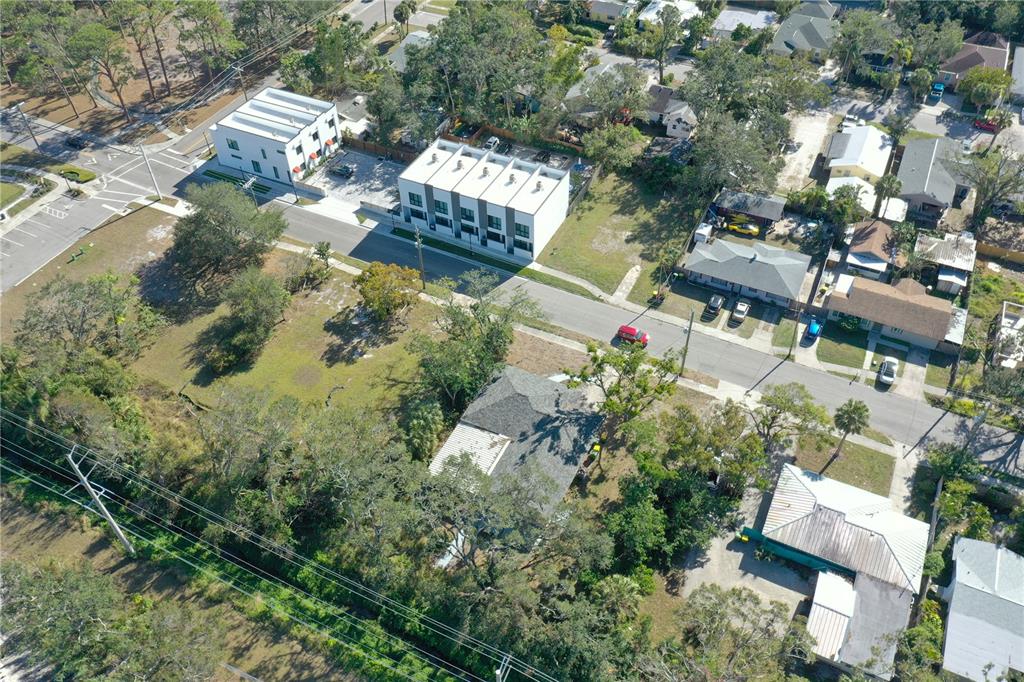 1744 10th Street Sarasota, FL 34236 - Photo 15 of 32 an aerial view of residential house with outdoor space and trees all around