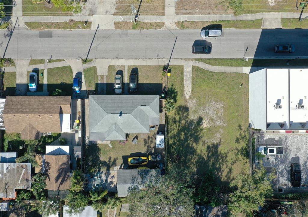 1744 10th Street Sarasota, FL 34236 - Photo 8 of 32 an aerial view of a house with a yard