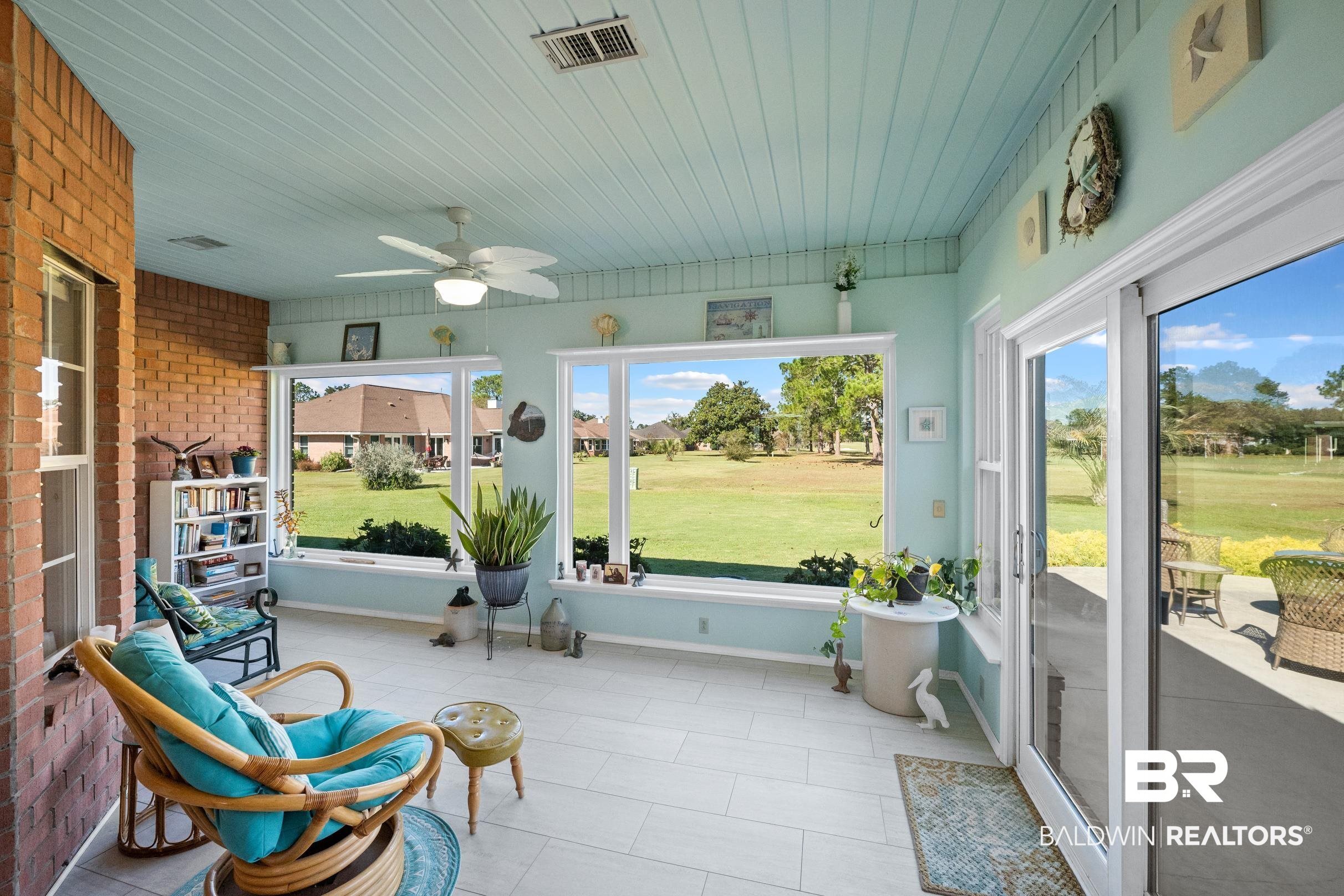 22355 East County Road 12 Foley, AL 36535 - Photo 41 of 54 Sunroom with a ceiling fan and healthy amount of natural light