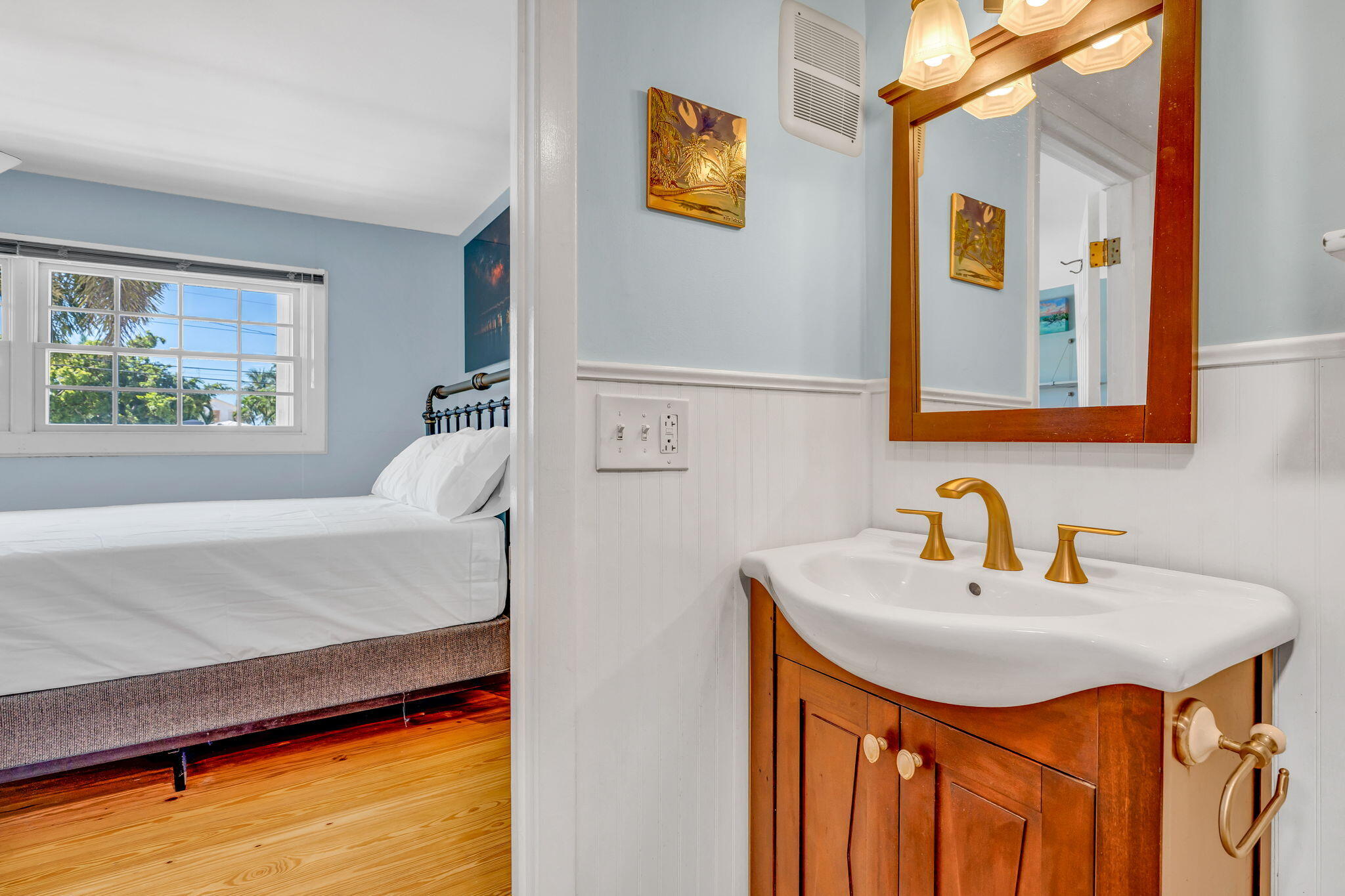 3365 Flagler Avenue Key West, FL 33040 - Photo 11 of 37 a bathroom with a sink and a mirror