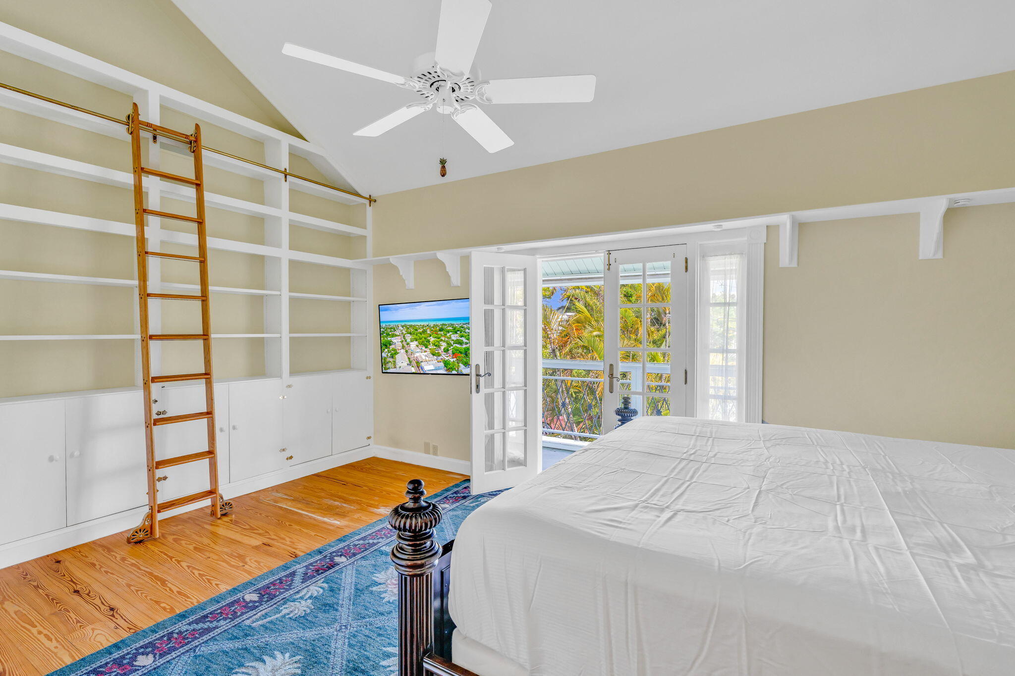 3365 Flagler Avenue Key West, FL 33040 - Photo 16 of 37 a bedroom with a bed and a window