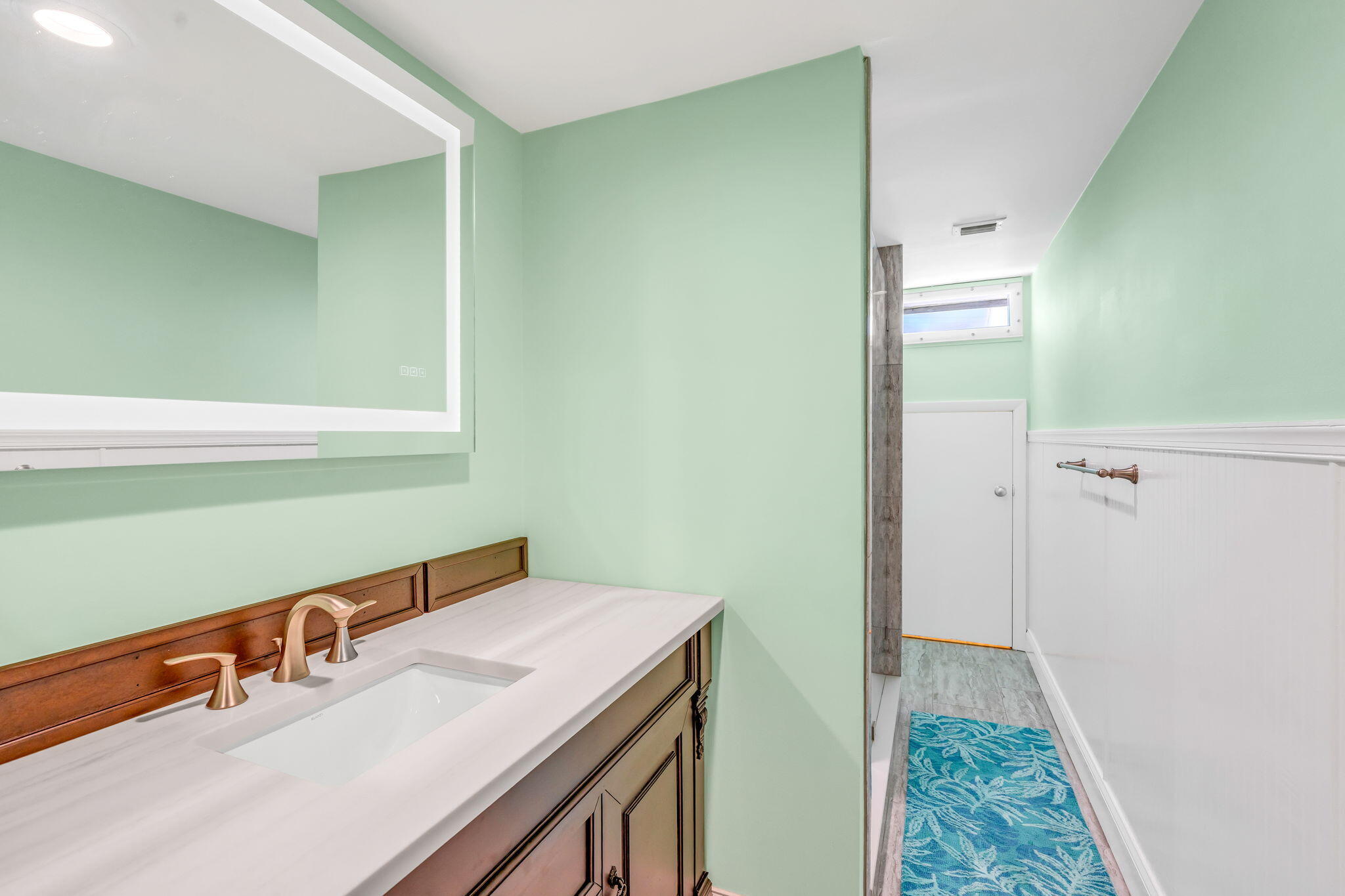 3365 Flagler Avenue Key West, FL 33040 - Photo 18 of 37 a bathroom with a sink and a mirror