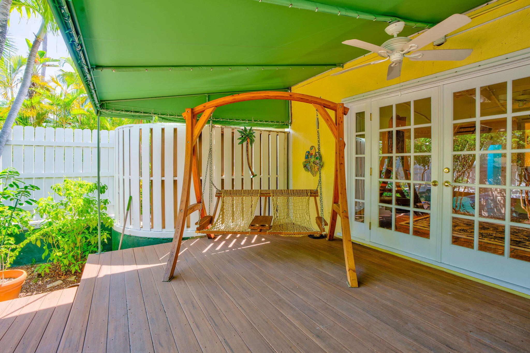 3365 Flagler Avenue Key West, FL 33040 - Photo 26 of 37 a view of a house with a wooden deck