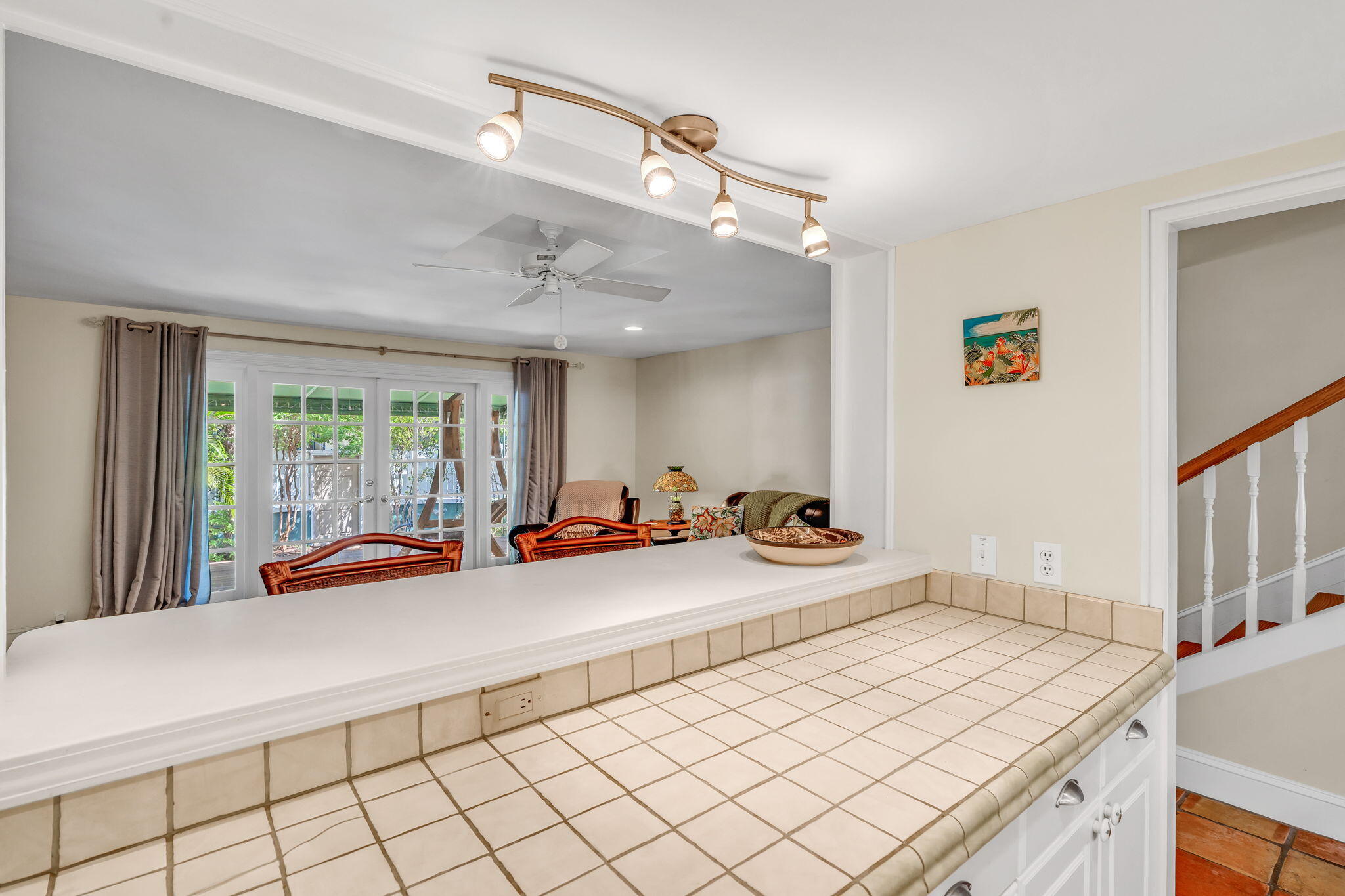 3365 Flagler Avenue Key West, FL 33040 - Photo 5 of 37 a bedroom with furniture and large windows
