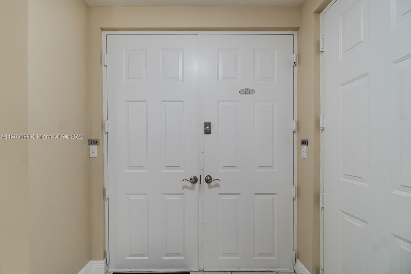 3210 Northeast 5th Street, Unit 203 Pompano Beach, FL 33062 - Photo 11 of 34 a bathroom with a shower