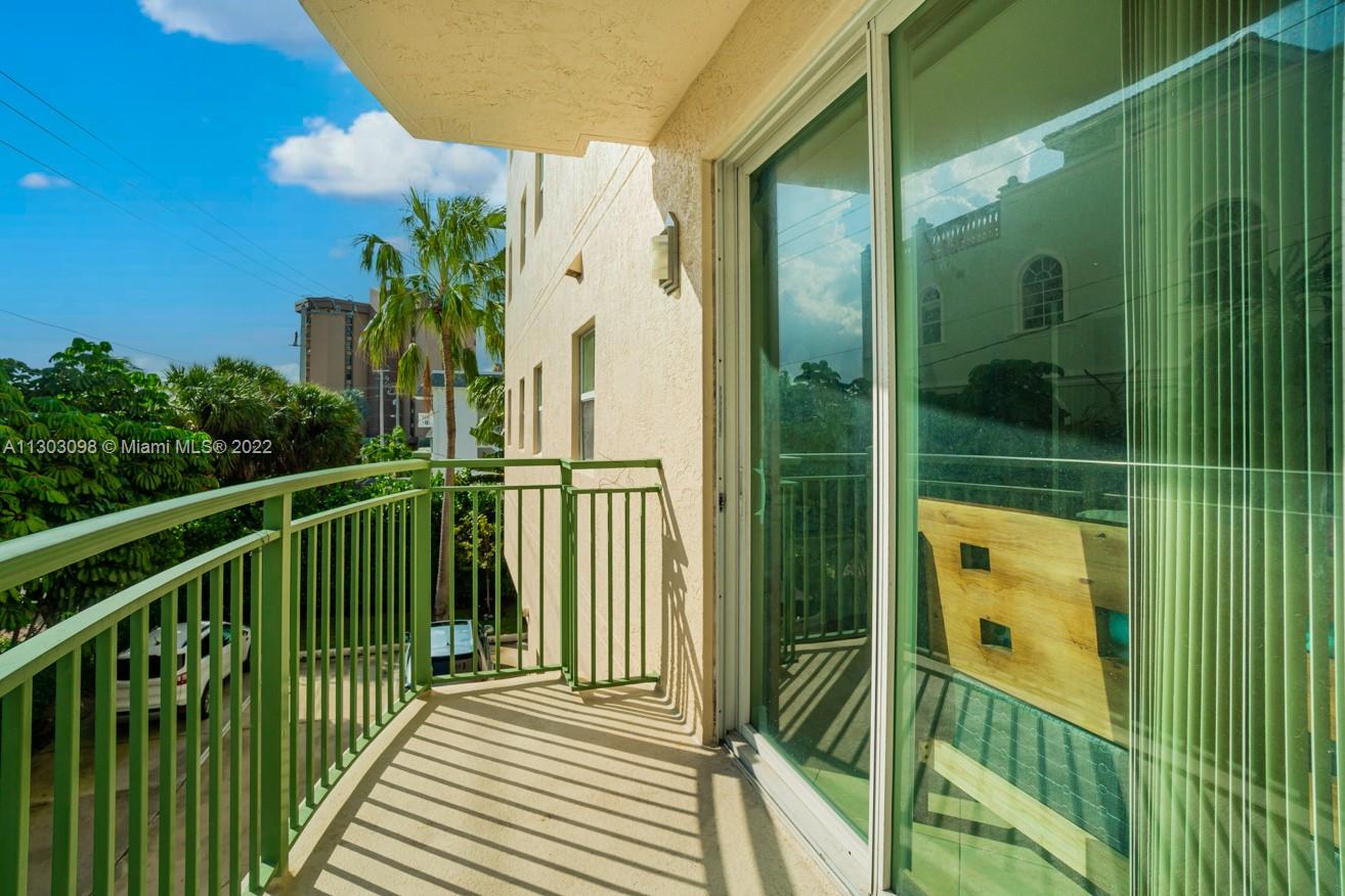 3210 Northeast 5th Street, Unit 203 Pompano Beach, FL 33062 - Photo 21 of 34 a view of a balcony