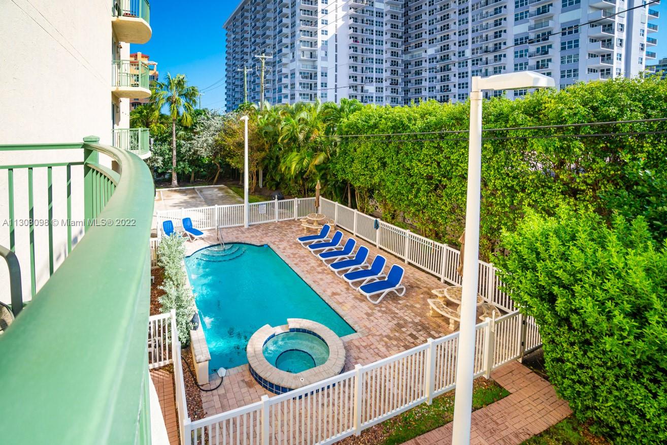 3210 Northeast 5th Street, Unit 203 Pompano Beach, FL 33062 - Photo 27 of 34 a view of an outdoor space