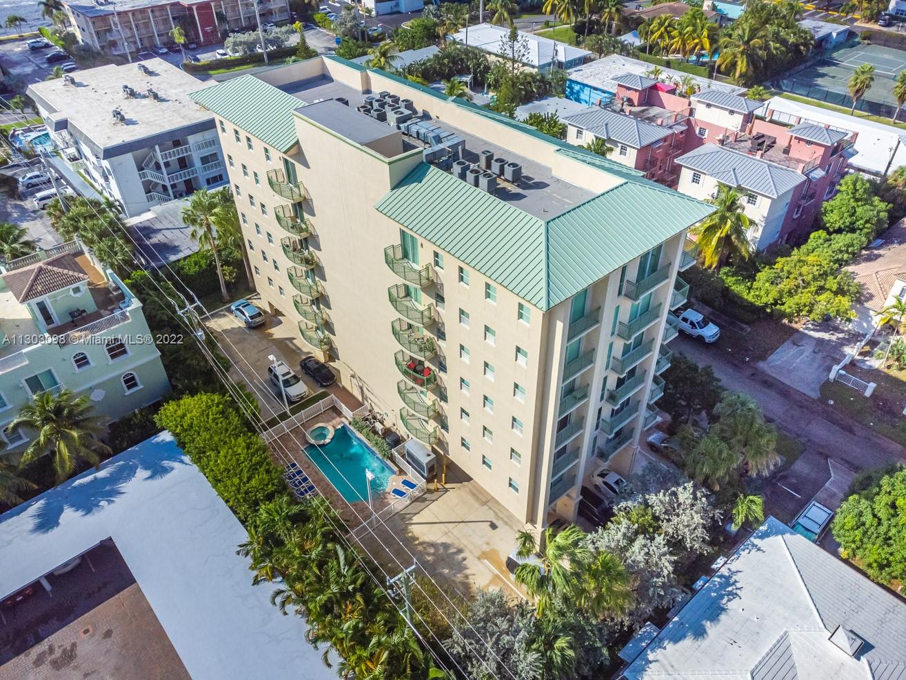 3210 Northeast 5th Street, Unit 203 Pompano Beach, FL 33062 - Photo 3 of 34 an aerial view of a city